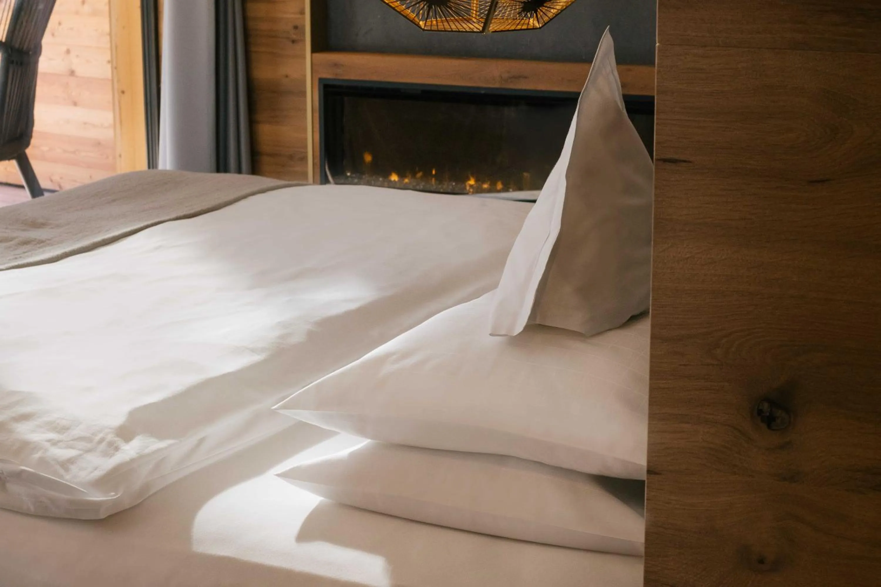 Bed in Cyprianerhof Dolomit Resort