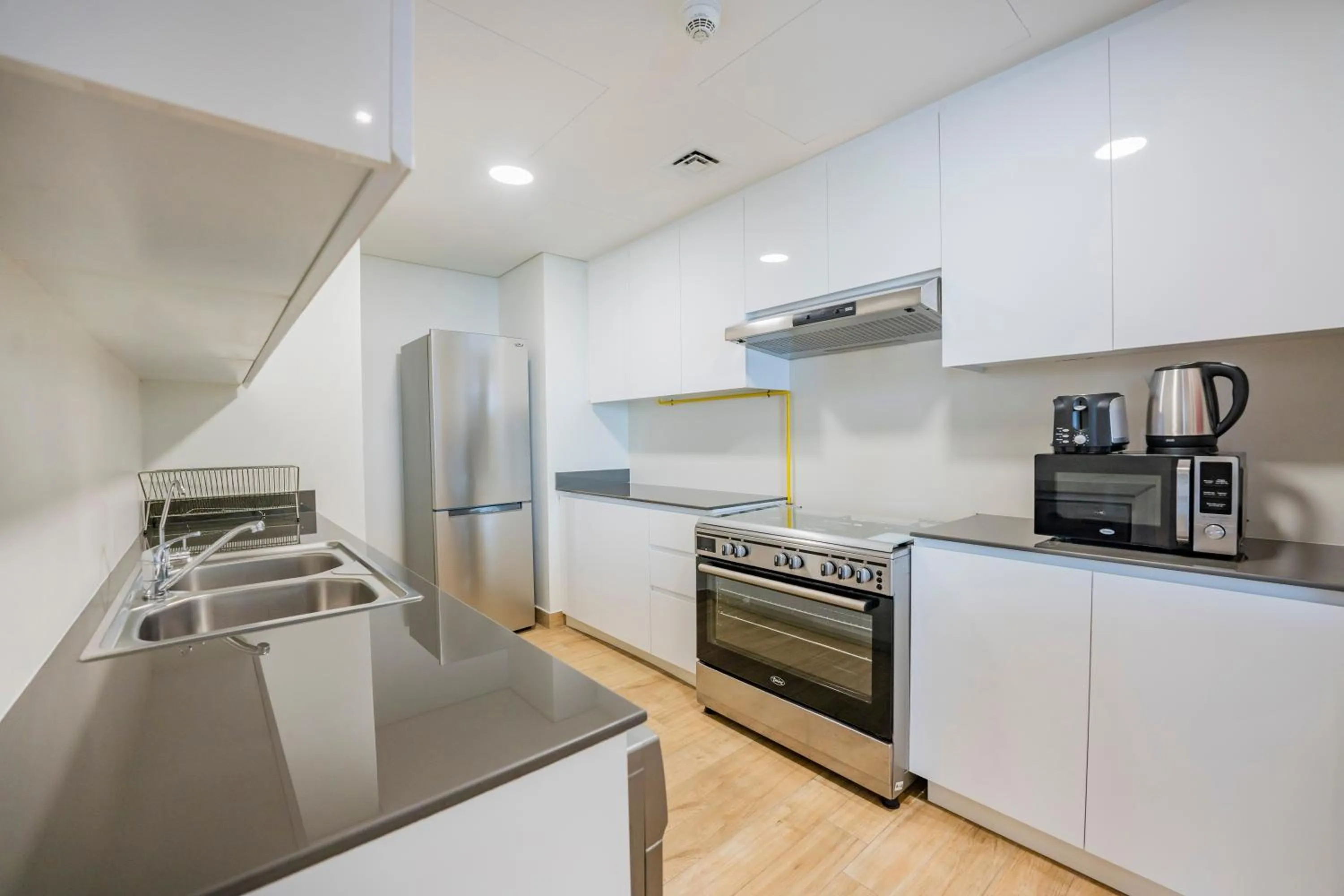 Kitchen or kitchenette in Expo Village Serviced Apartments