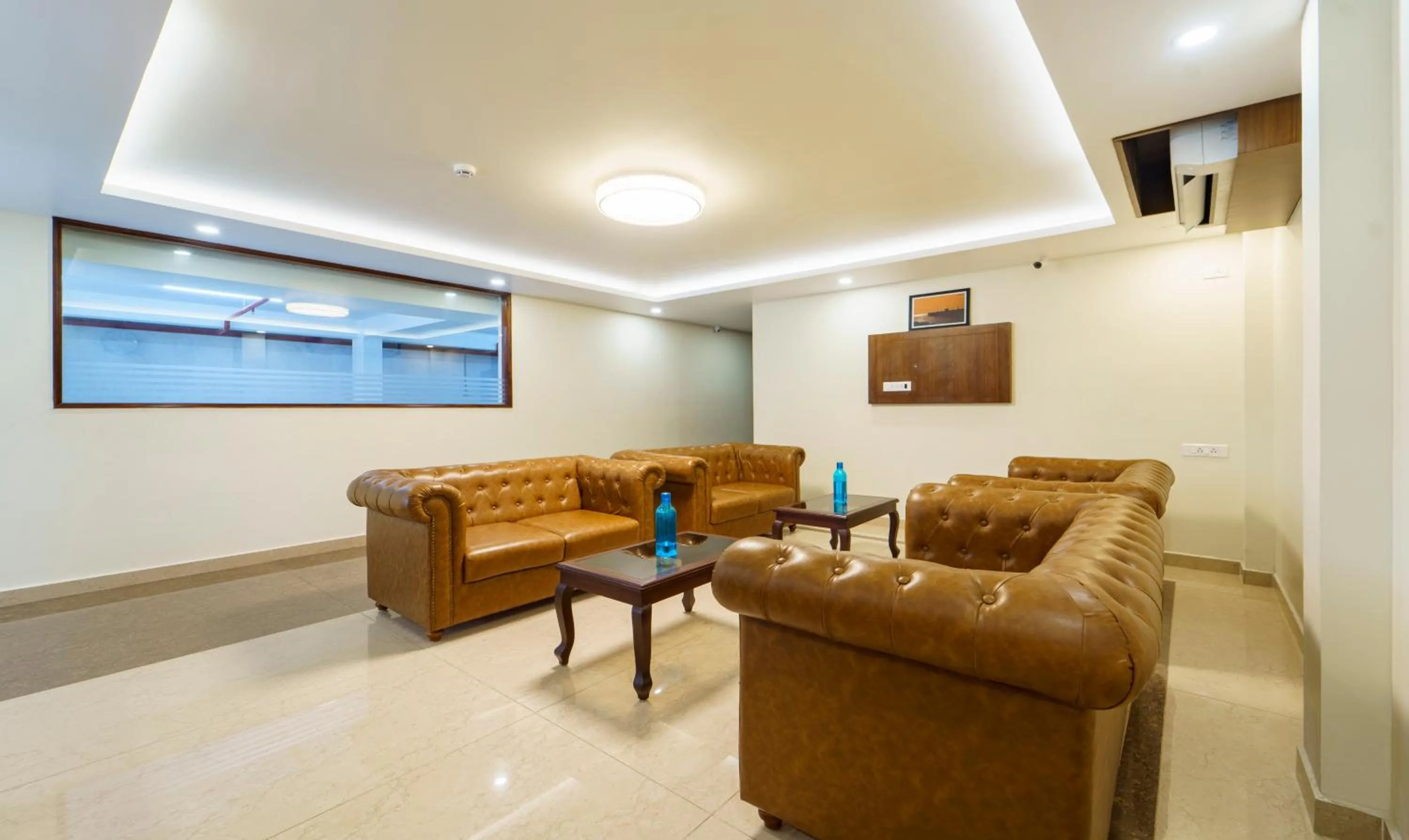 Seating area in Treebo Aaravi Residency, 800 Mtrs From Promenade Beach