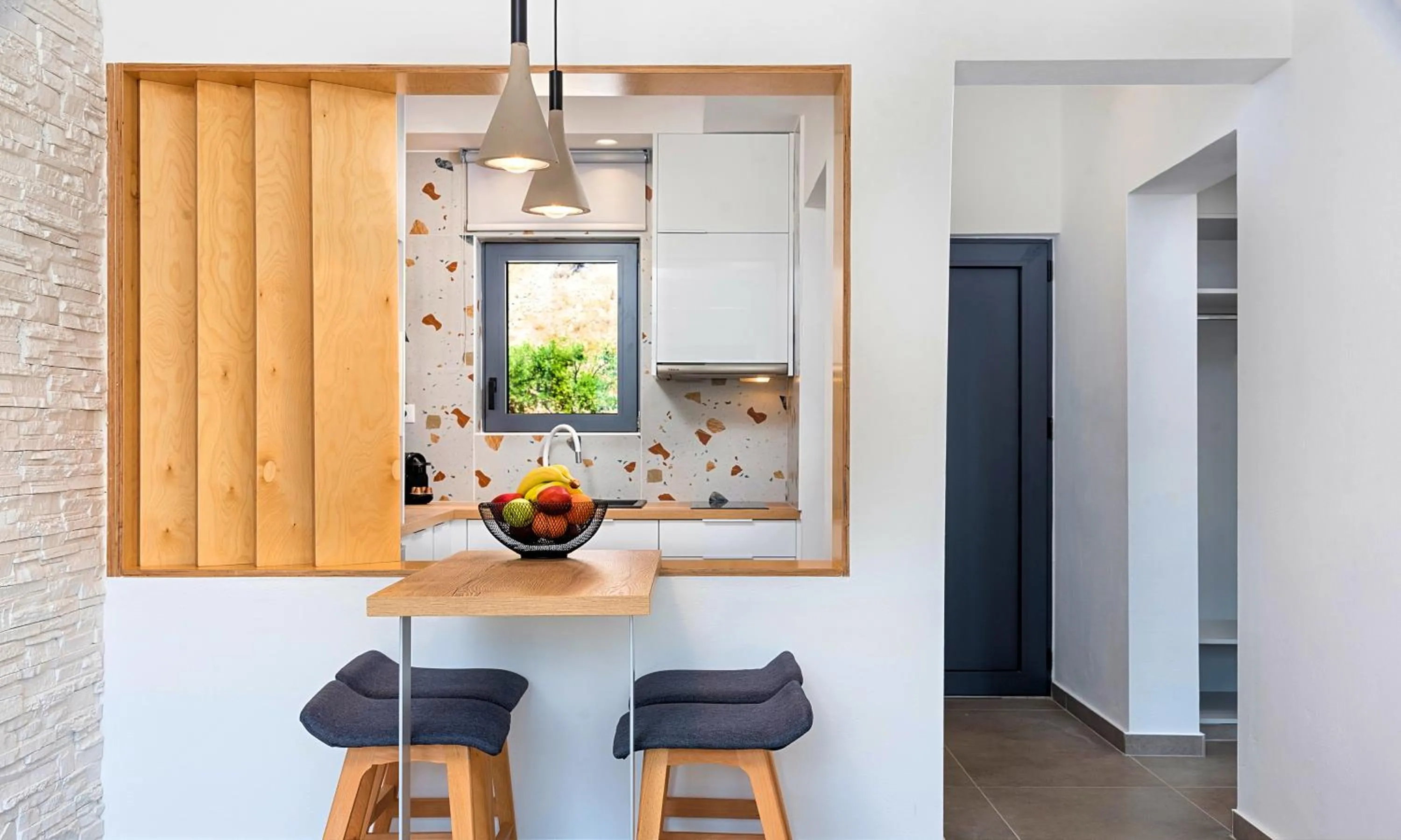 Kitchen or kitchenette in Aelia Suites