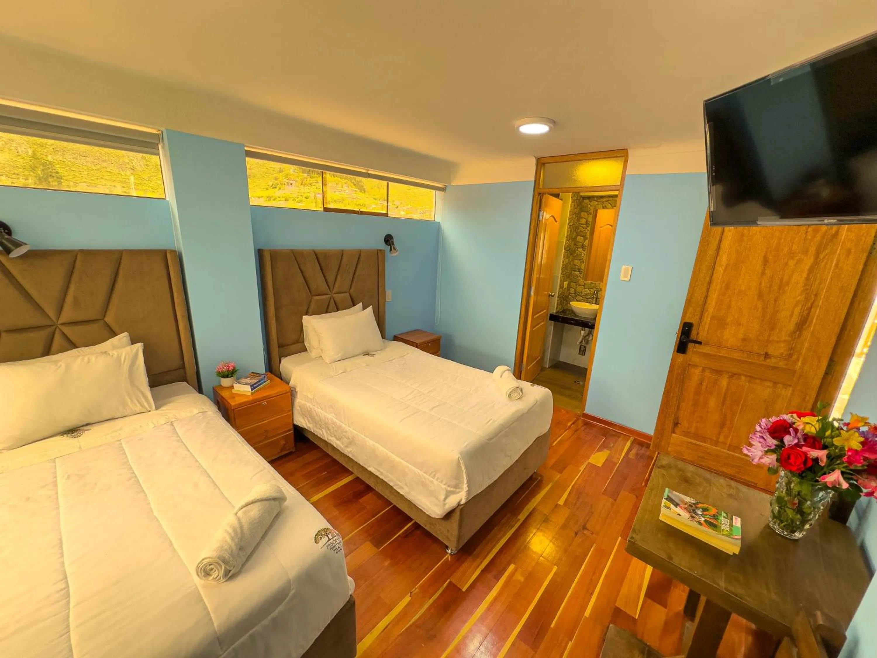 Bed in Pisonay Hotel