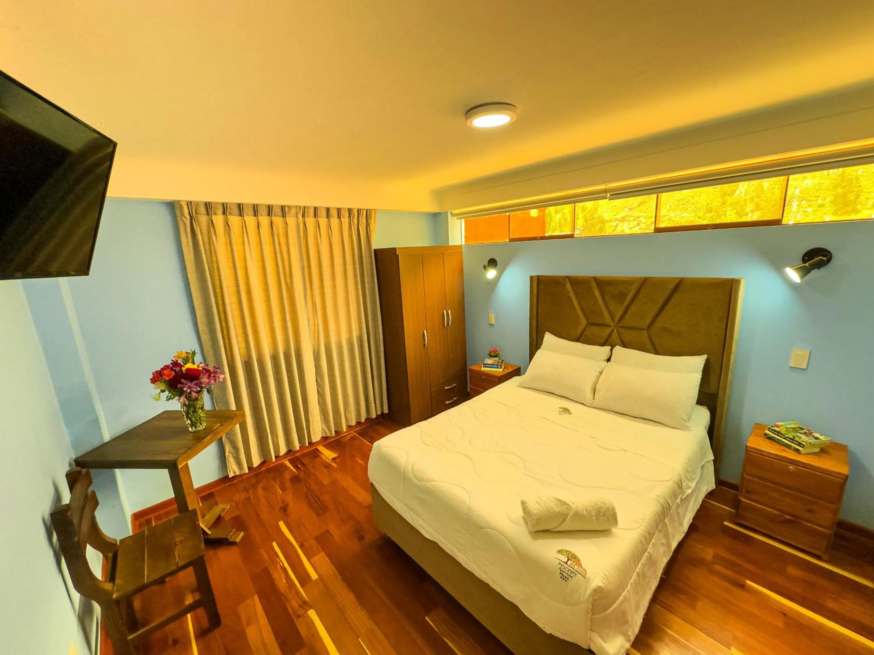 Bed in Pisonay Hotel