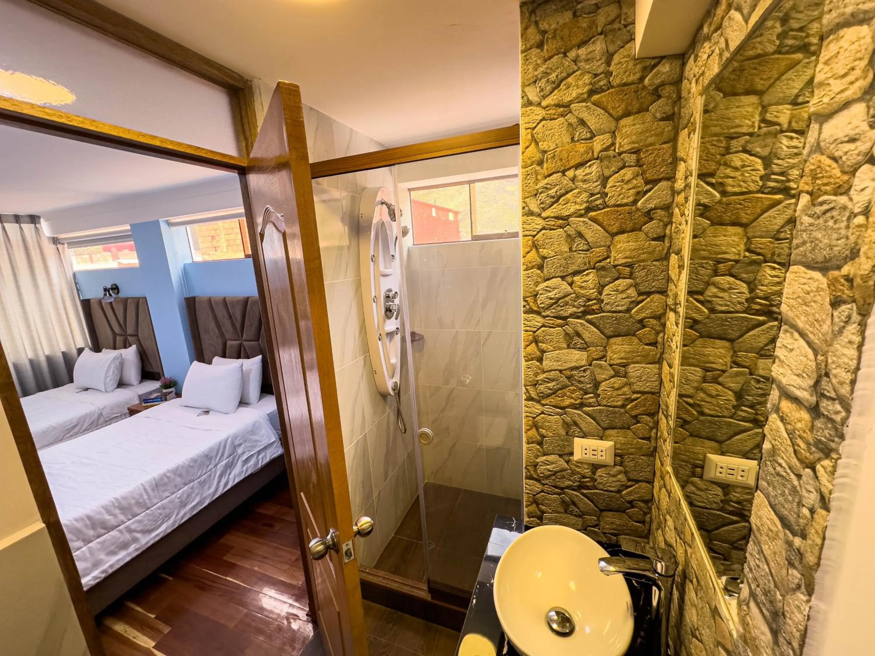 Bed in Pisonay Hotel