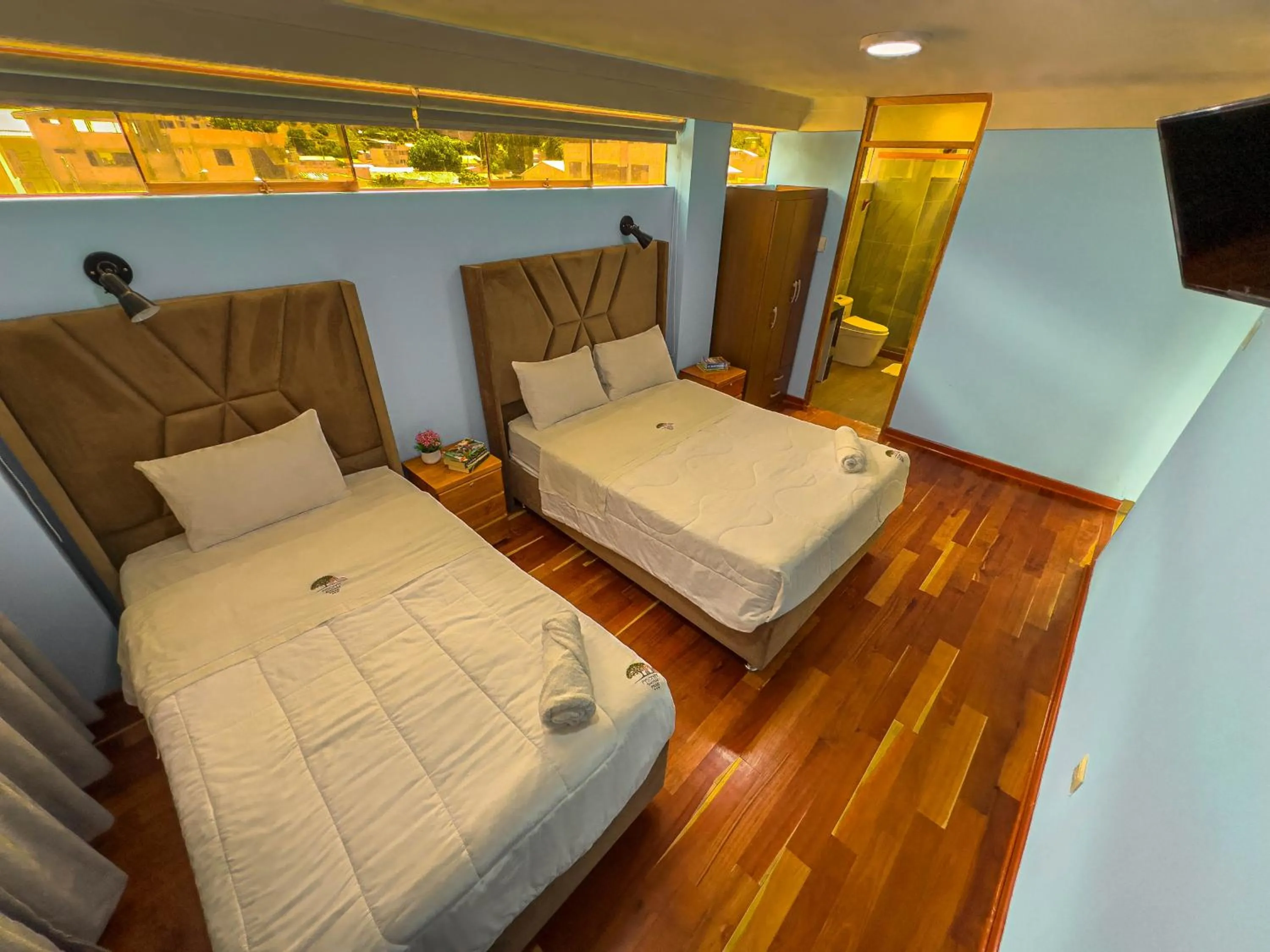 Bed in Pisonay Hotel