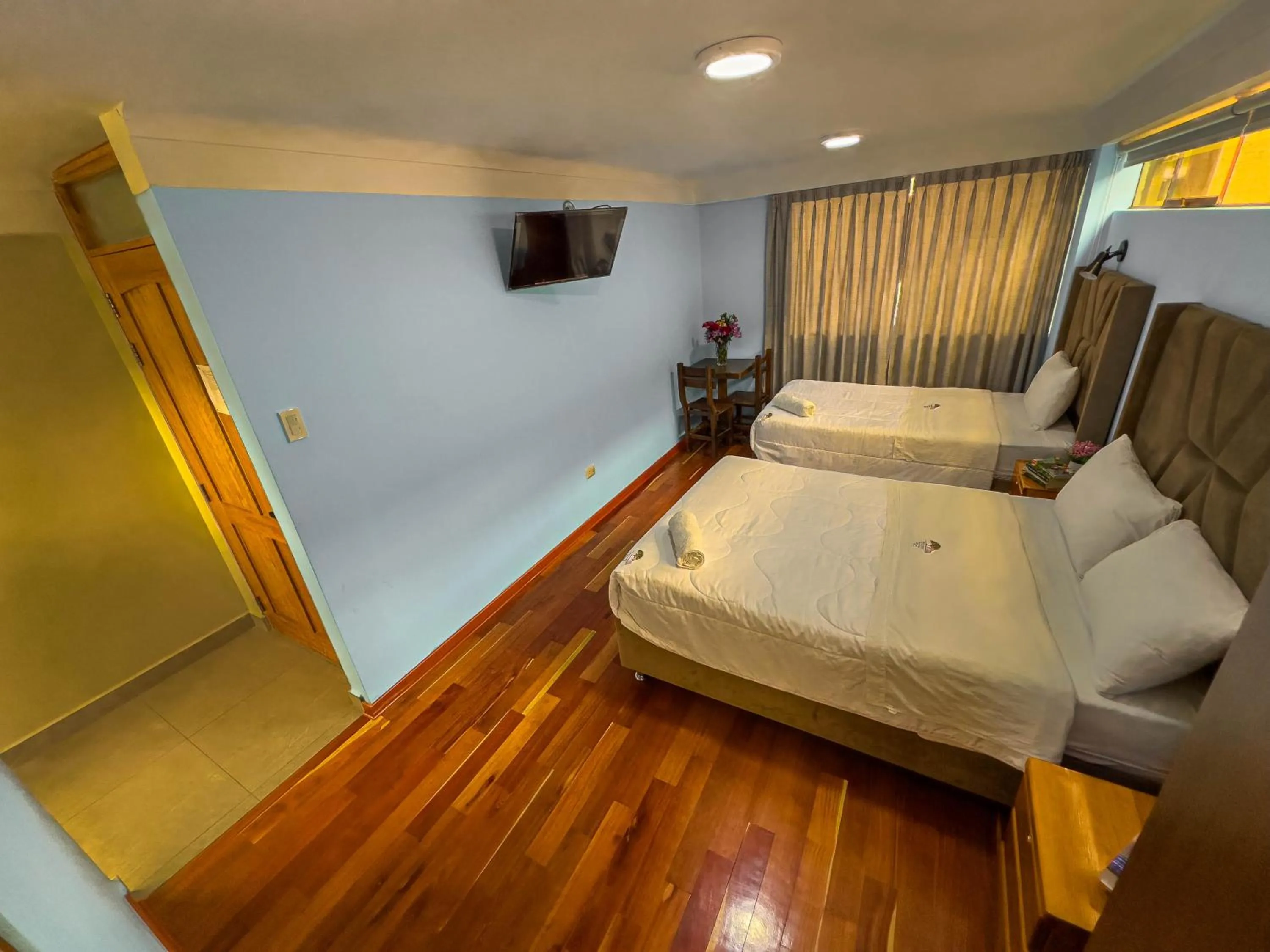 Bed in Pisonay Hotel