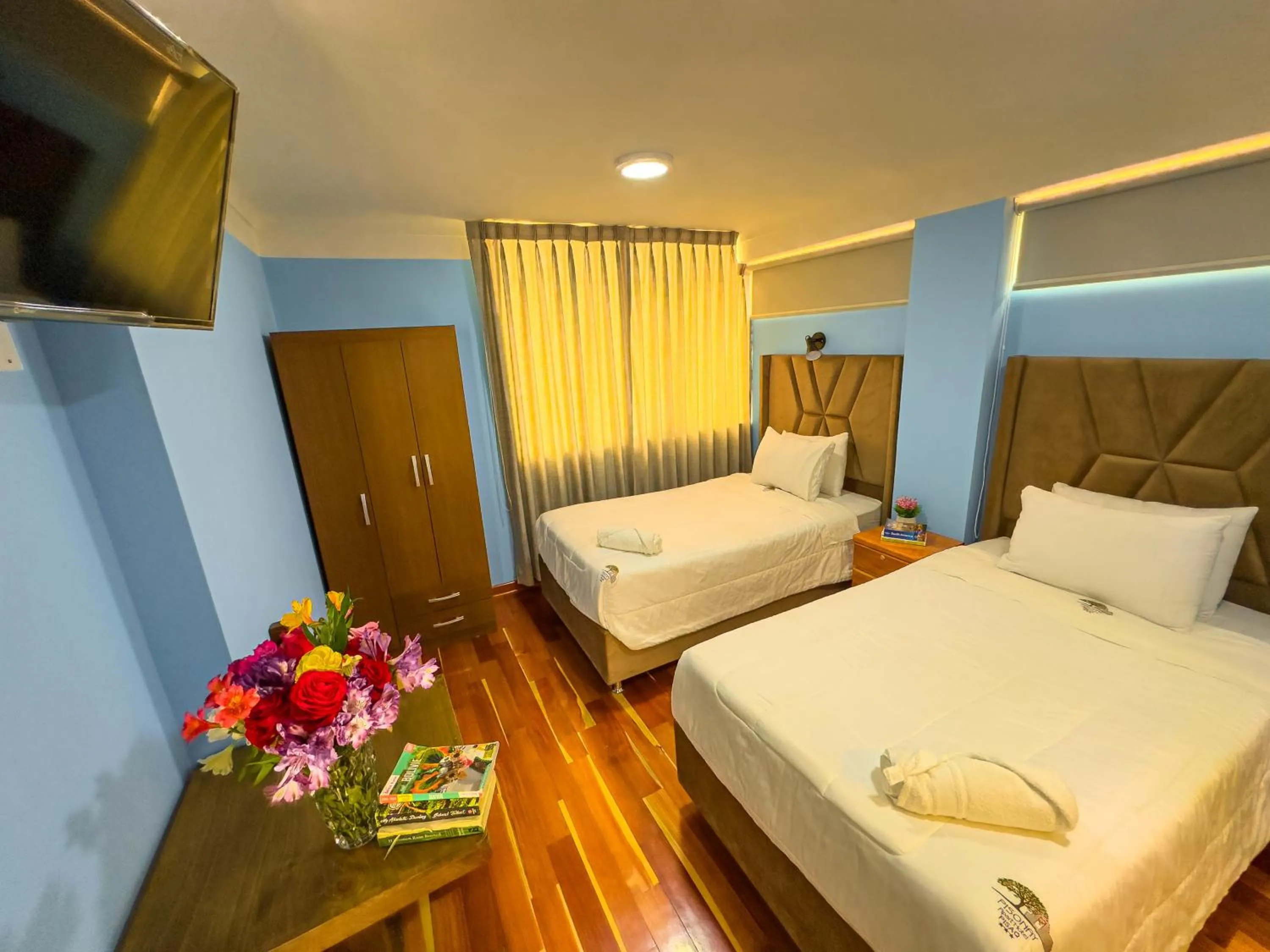 Bed in Pisonay Hotel