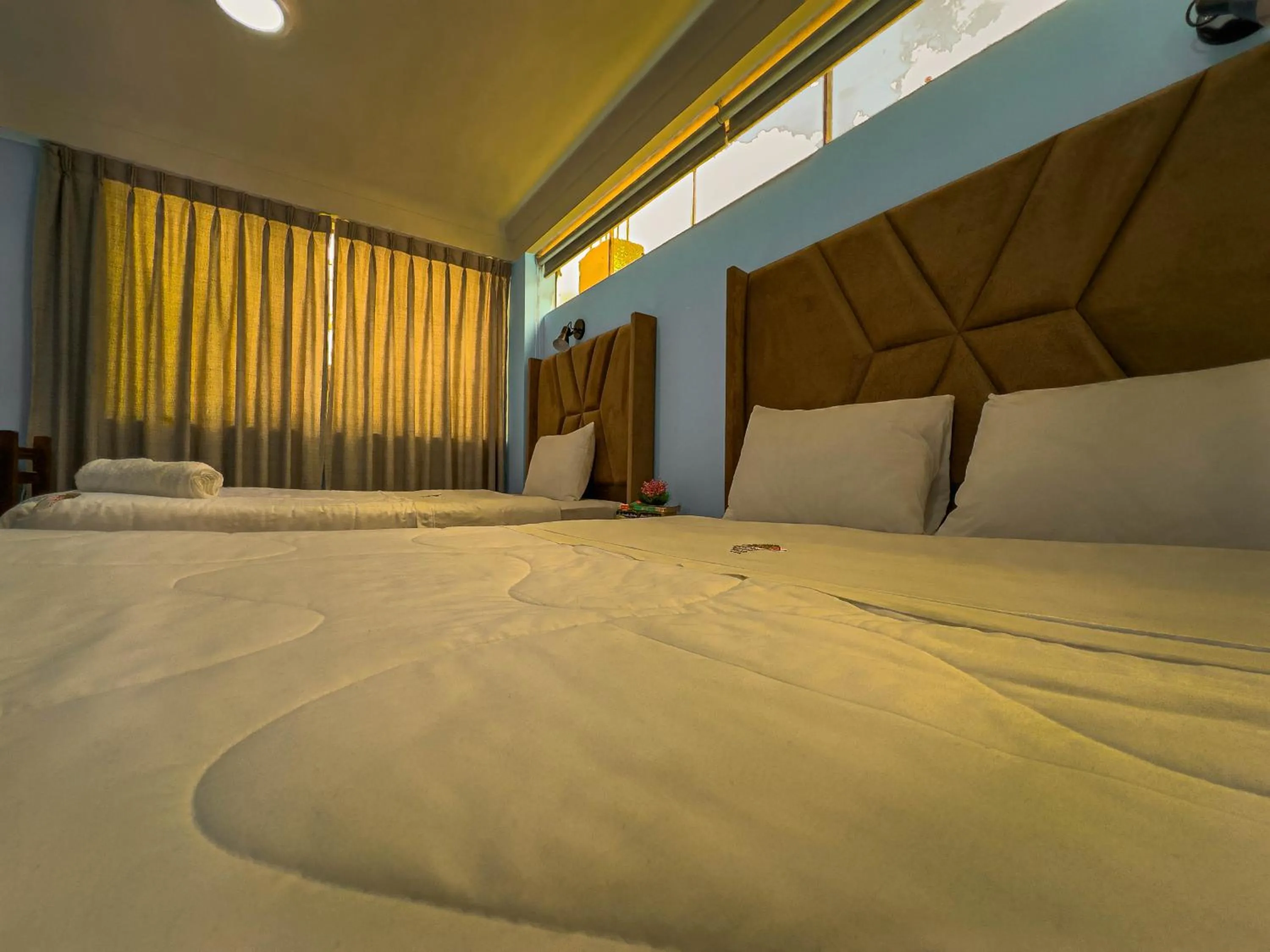 Bed in Pisonay Hotel