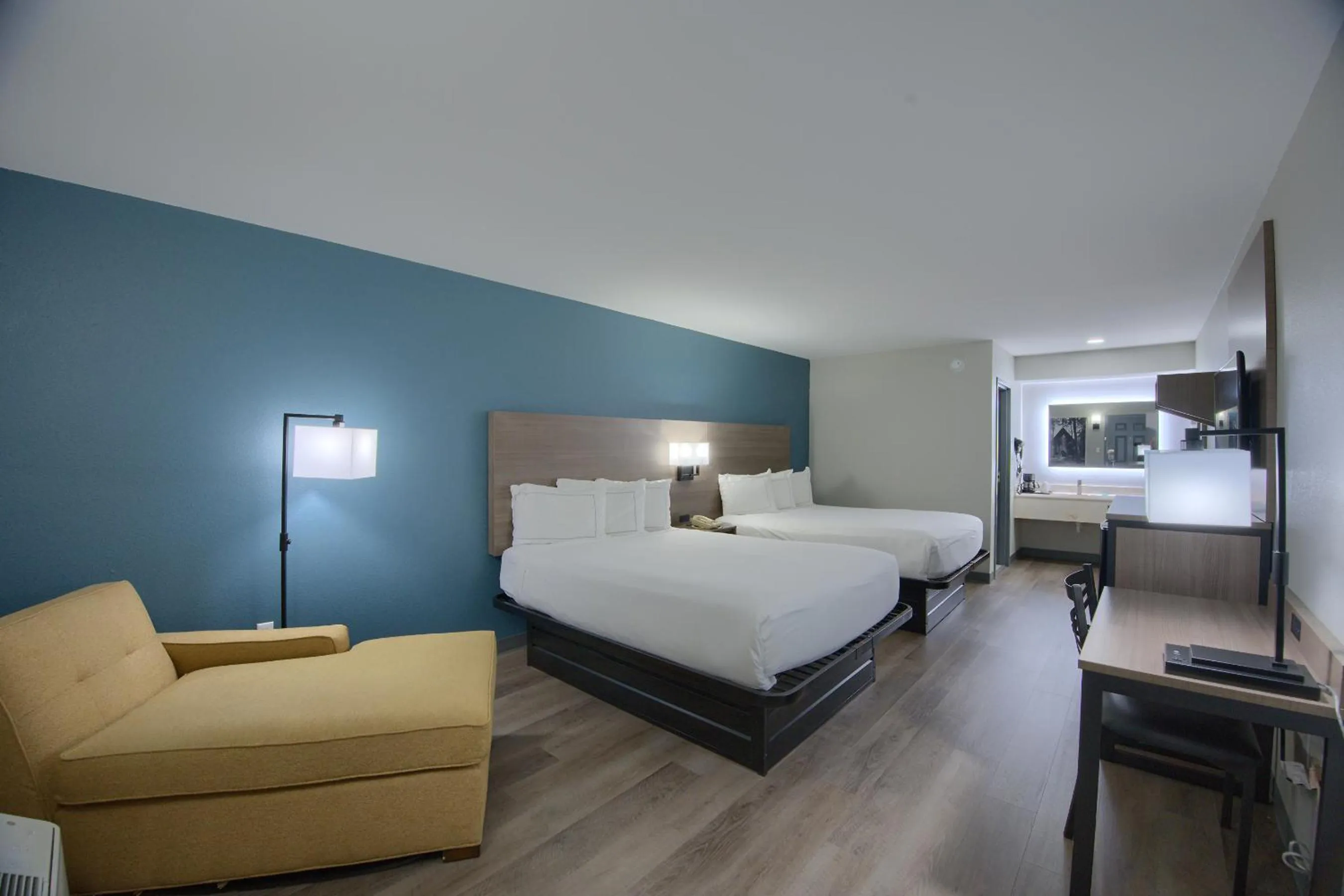 Photo of the whole room, Bed in Hot Springs Village Inn