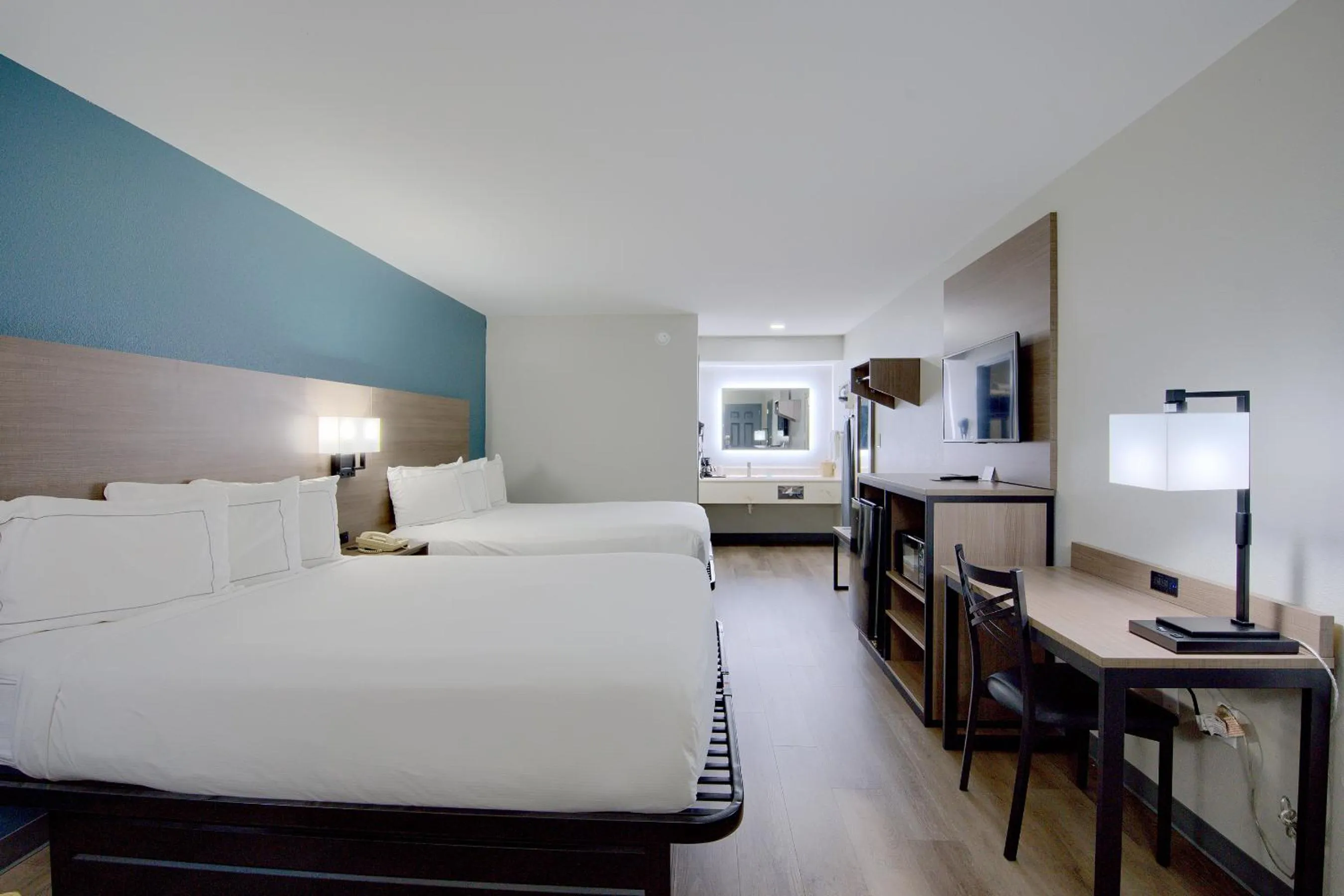 Photo of the whole room, Bed in Hot Springs Village Inn