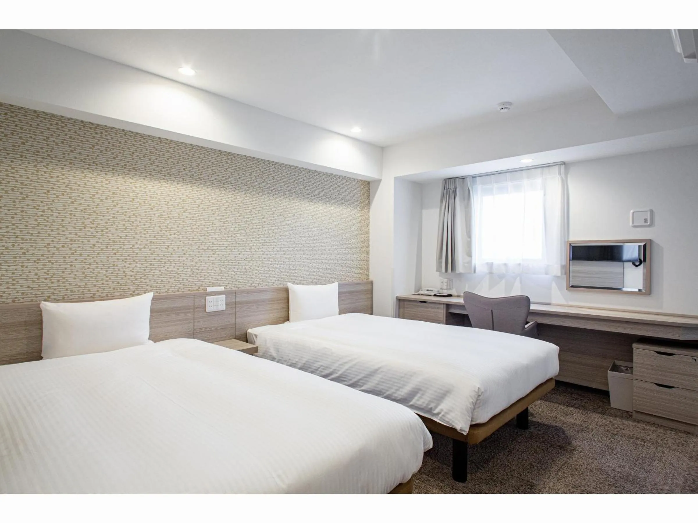 Bed in Kuretake Inn Premium Tajimi Ekimae