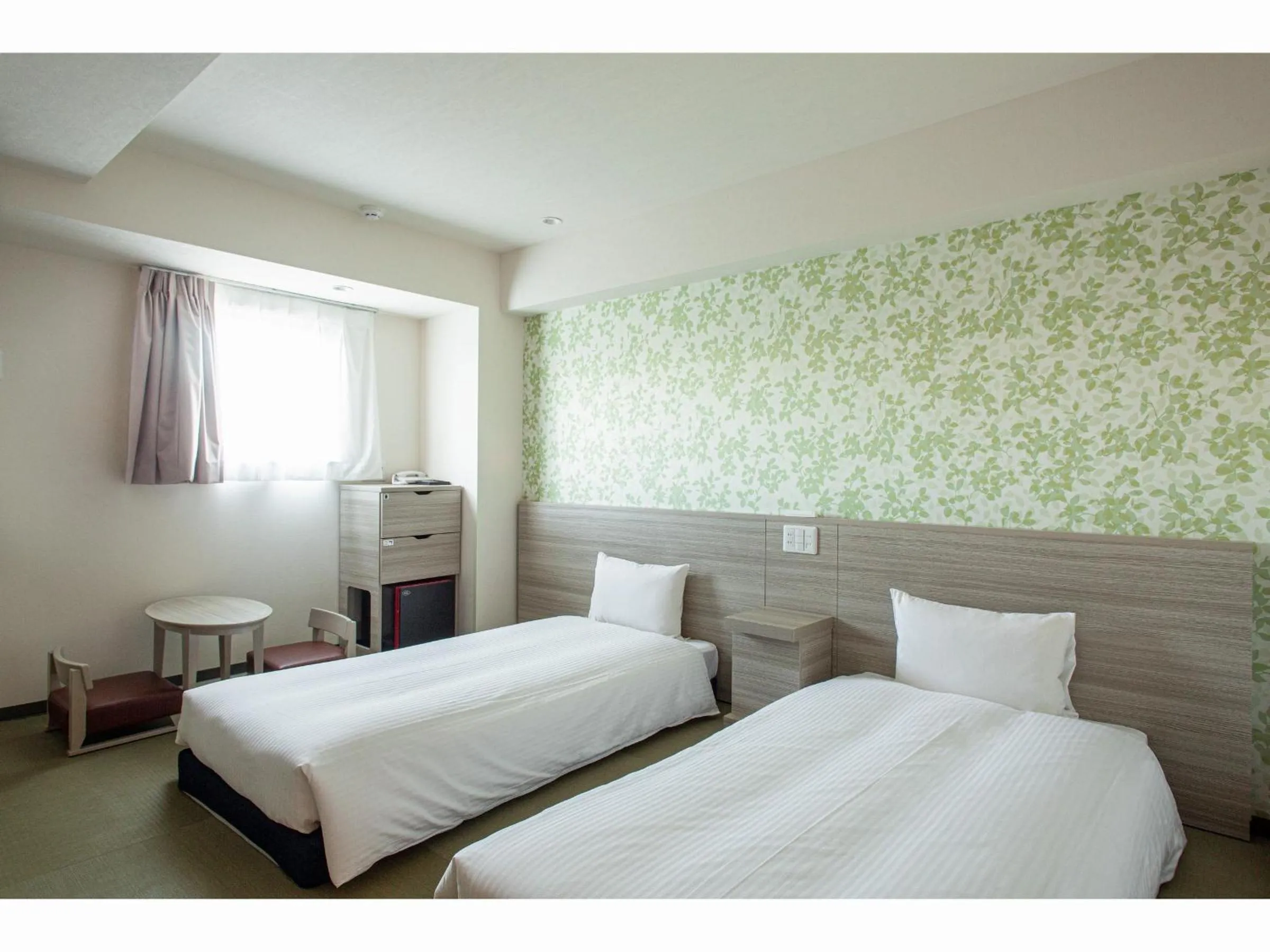 Bed in Kuretake Inn Premium Tajimi Ekimae