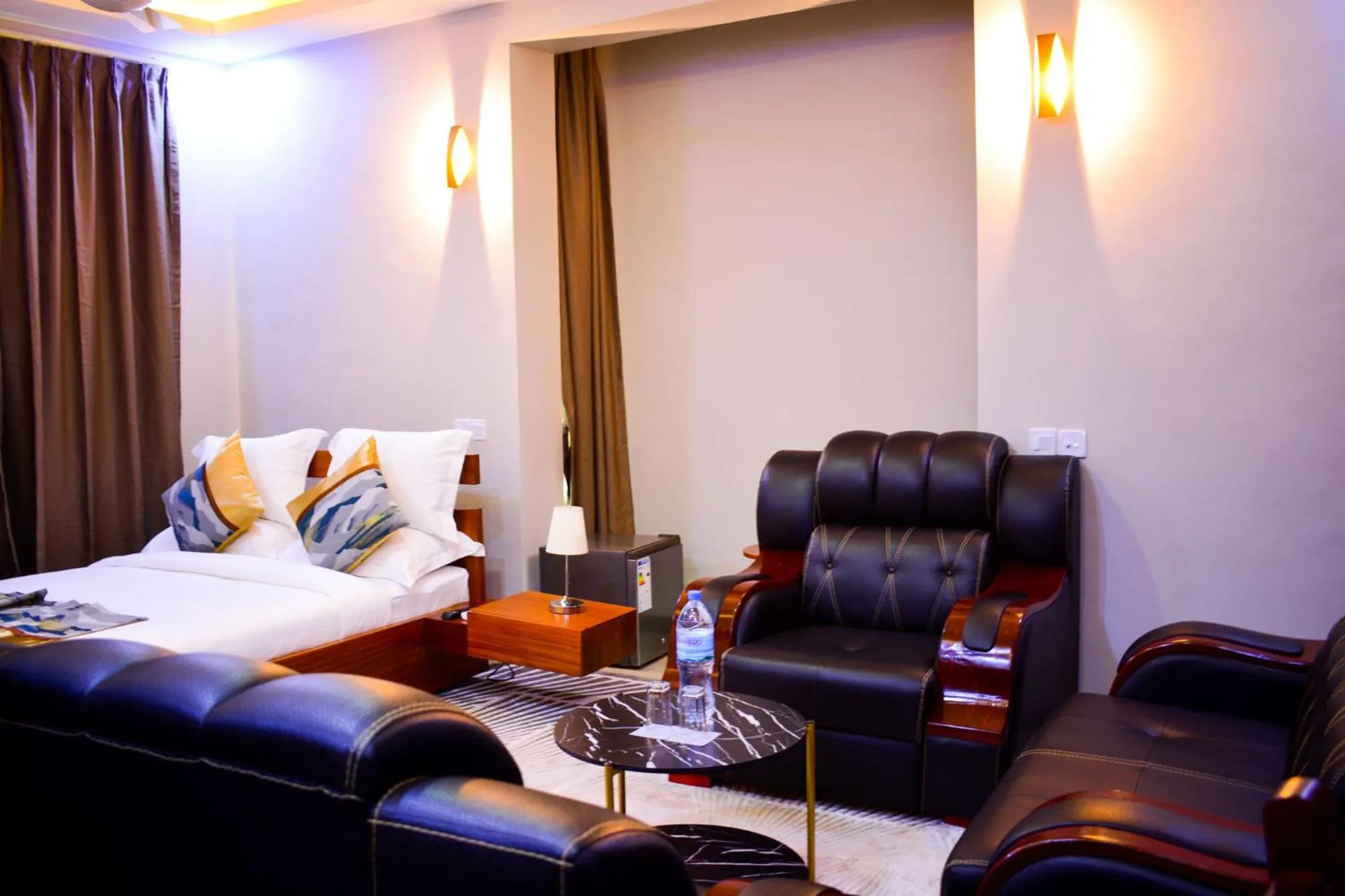 Bed in Inoga Luxury Hotel