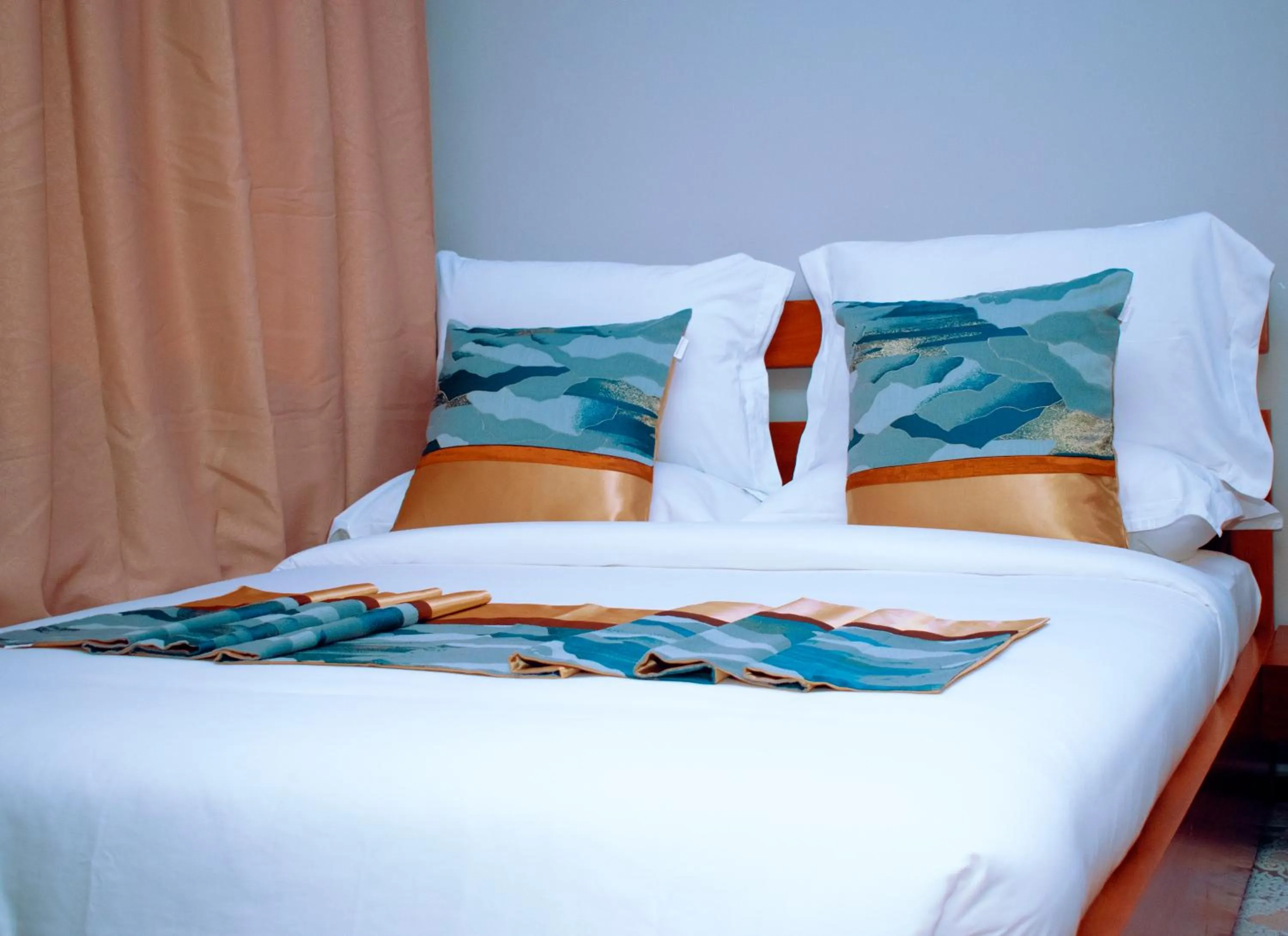 Bed in Inoga Luxury Hotel