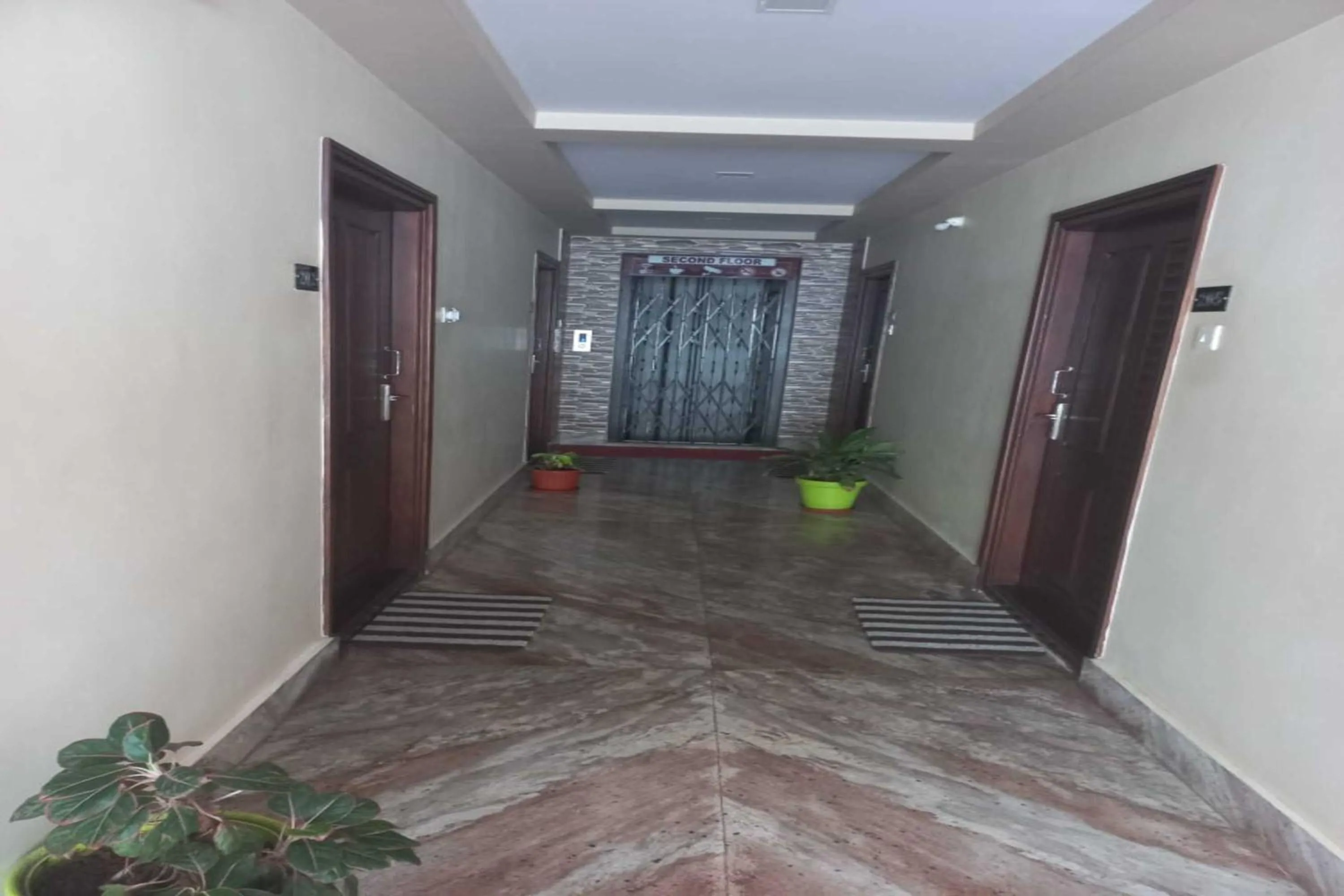 Lobby or reception in Bhimas Residency