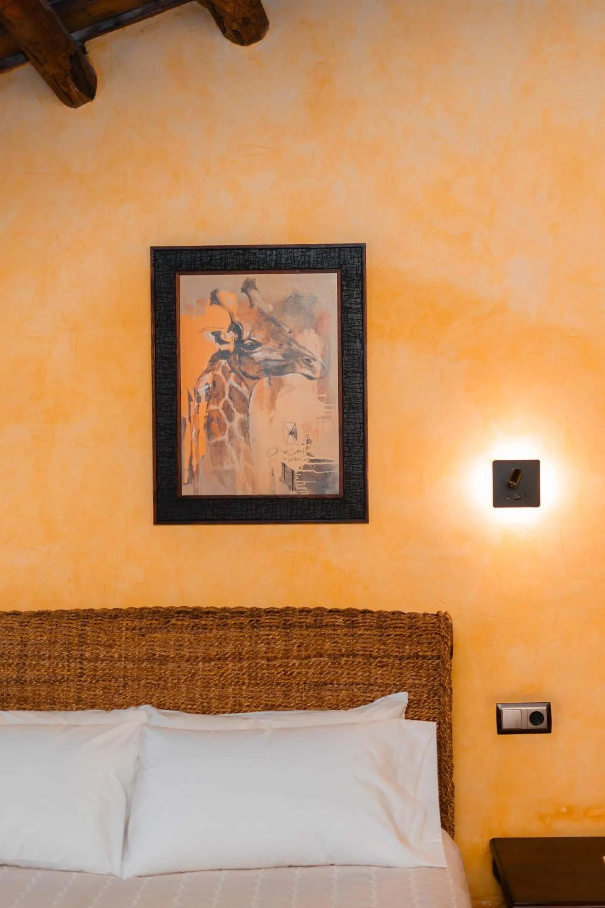 Bed in L'Agora Hotel