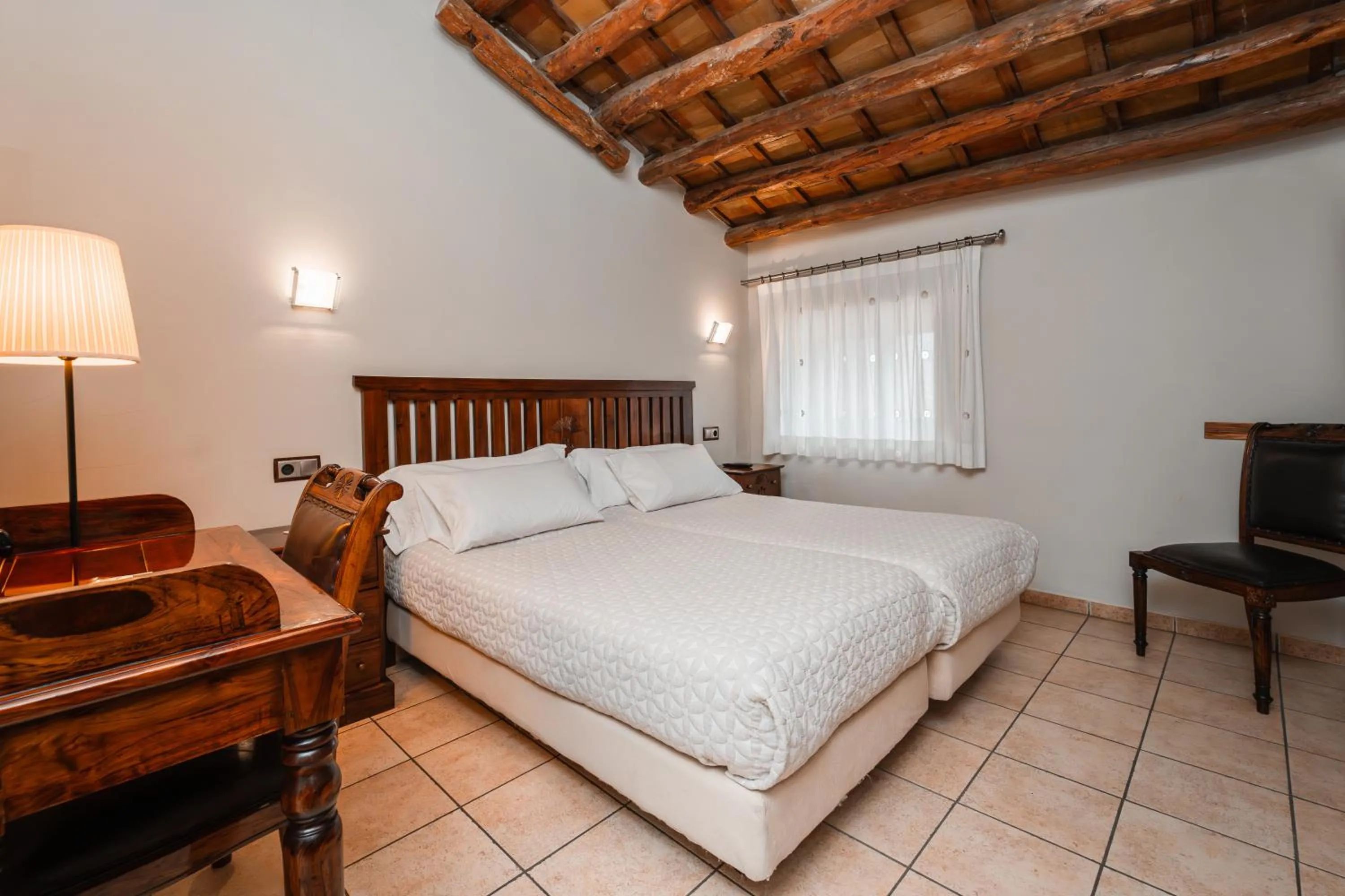 Bed in L'Agora Hotel