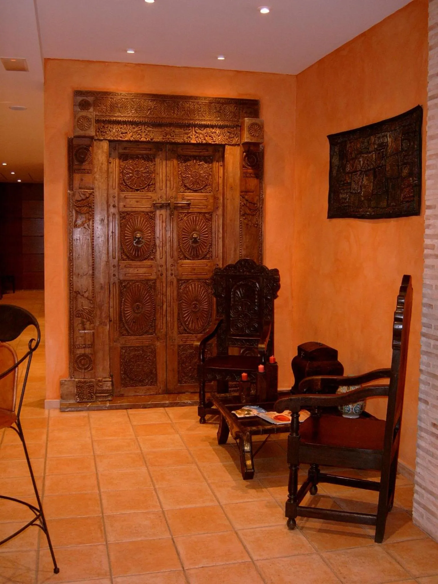 Seating area in L'Agora Hotel