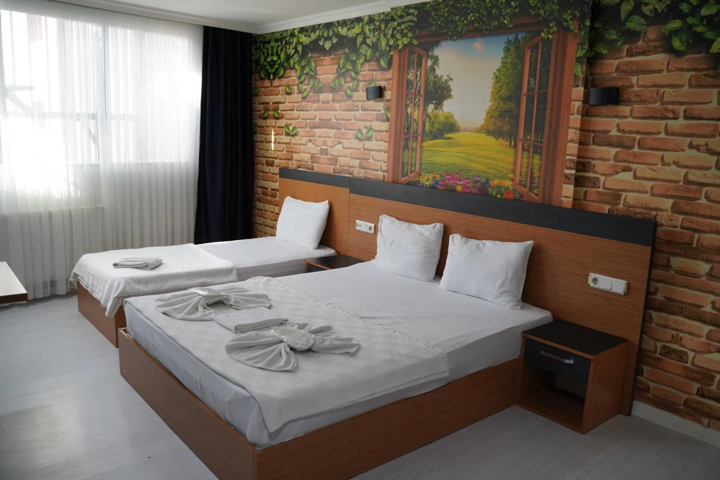 Bed in Heraldic Room Hotel