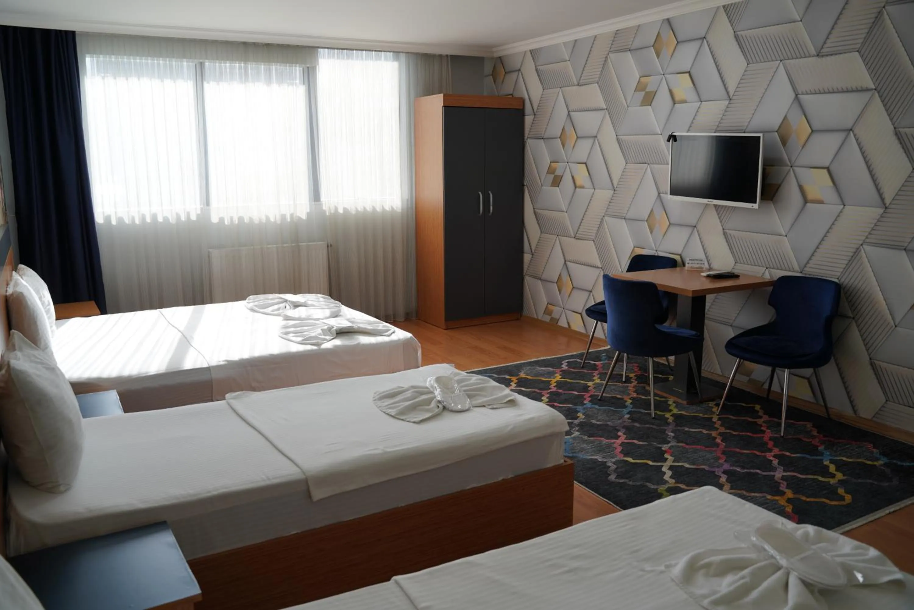 Bed in Heraldic Room Hotel