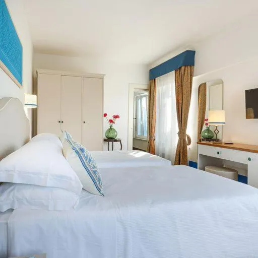 Bed in Riva di Palo Beach Hotel