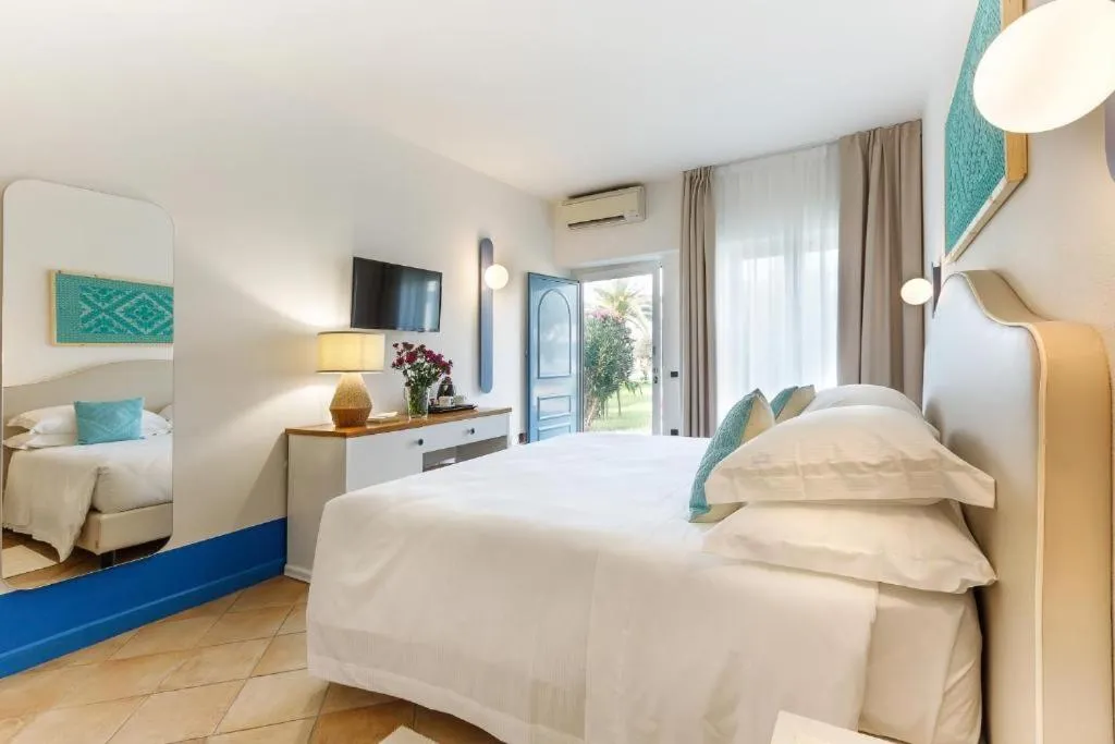 Bed in Riva di Palo Beach Hotel