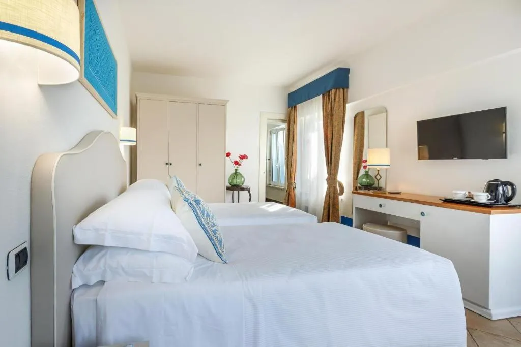 Bed in Riva di Palo Beach Hotel