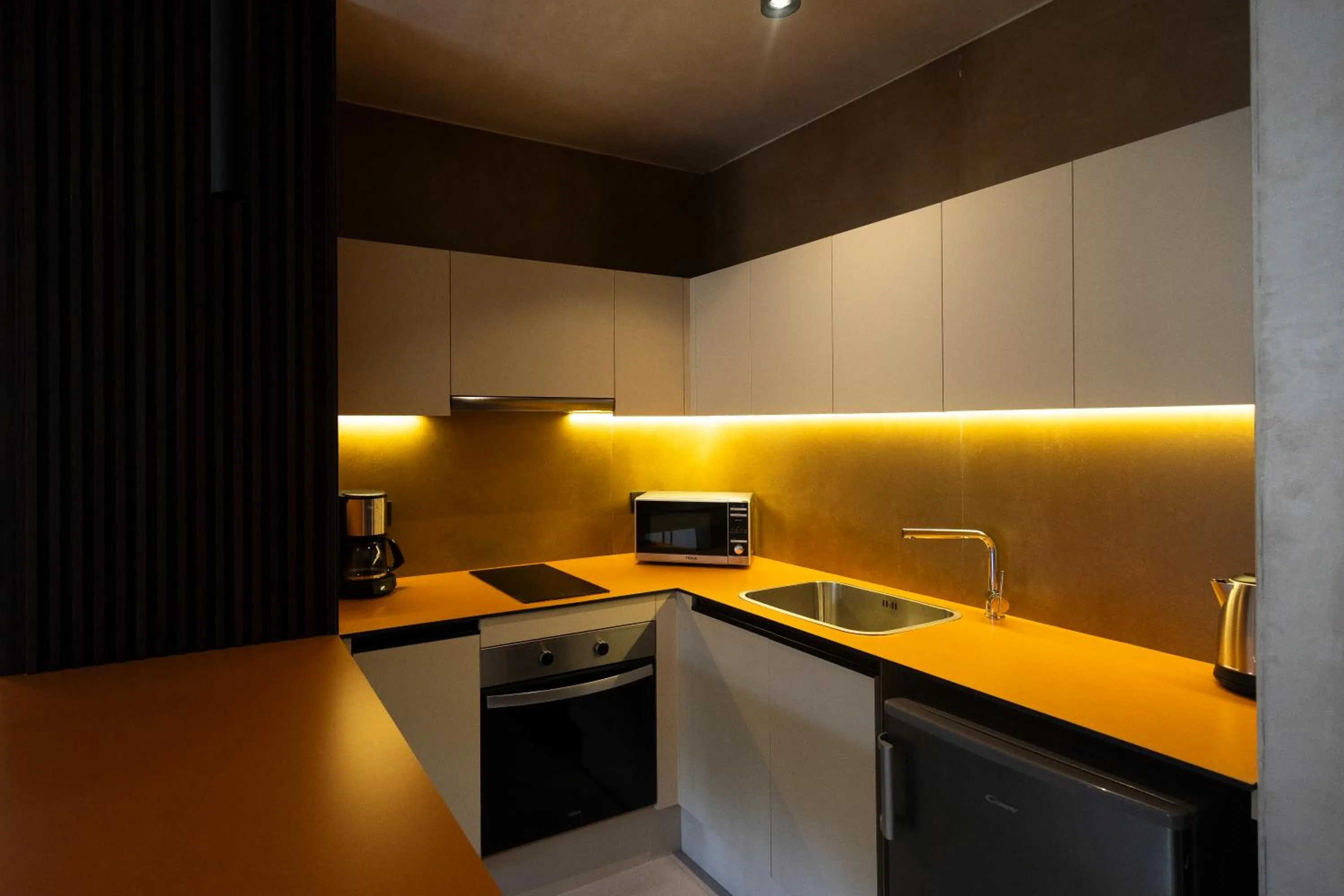 Kitchen or kitchenette in Apartamentos Playazul