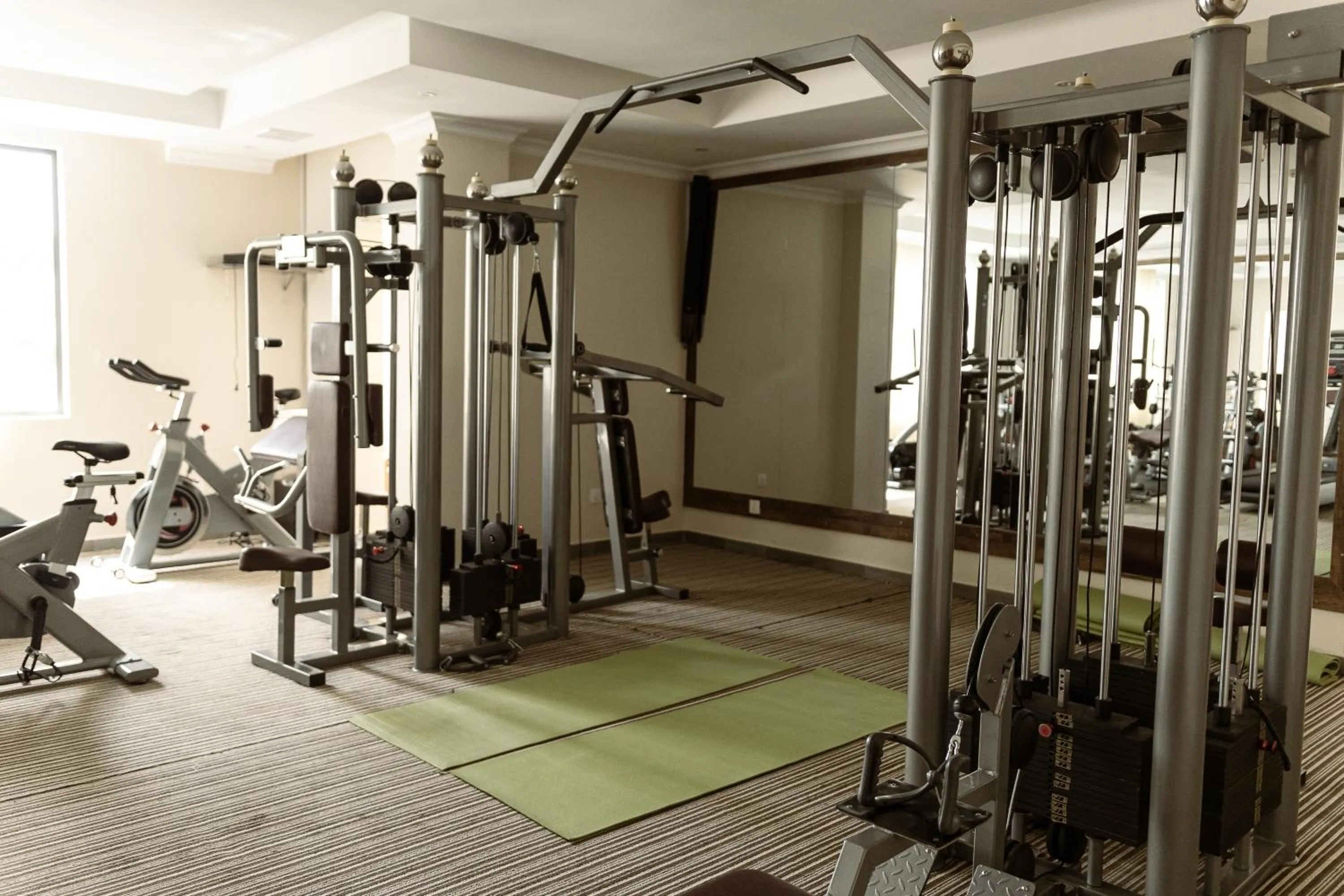 Fitness centre/facilities in Urban Park Suites Hotel