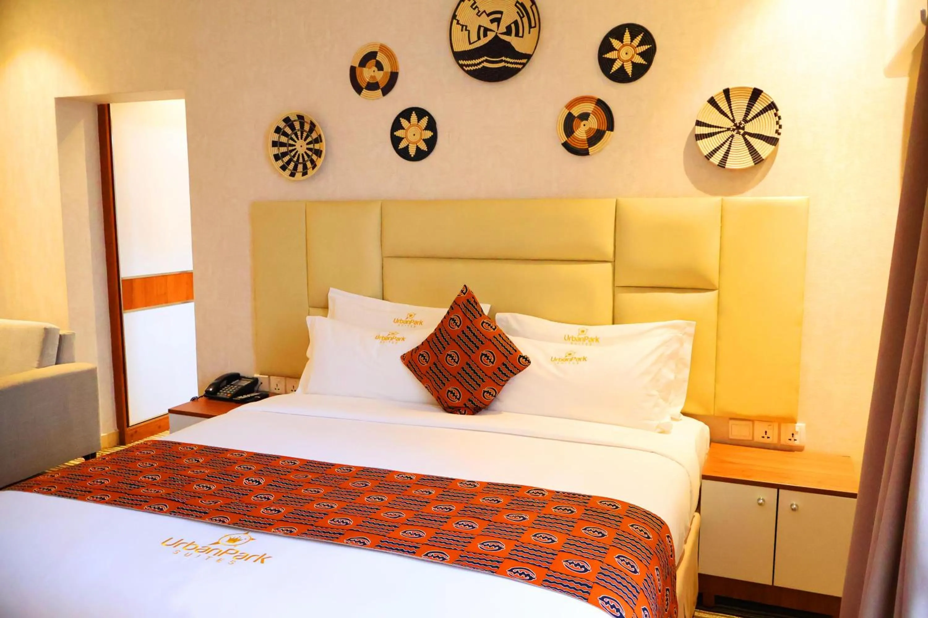 Bed in Urban Park Suites Hotel