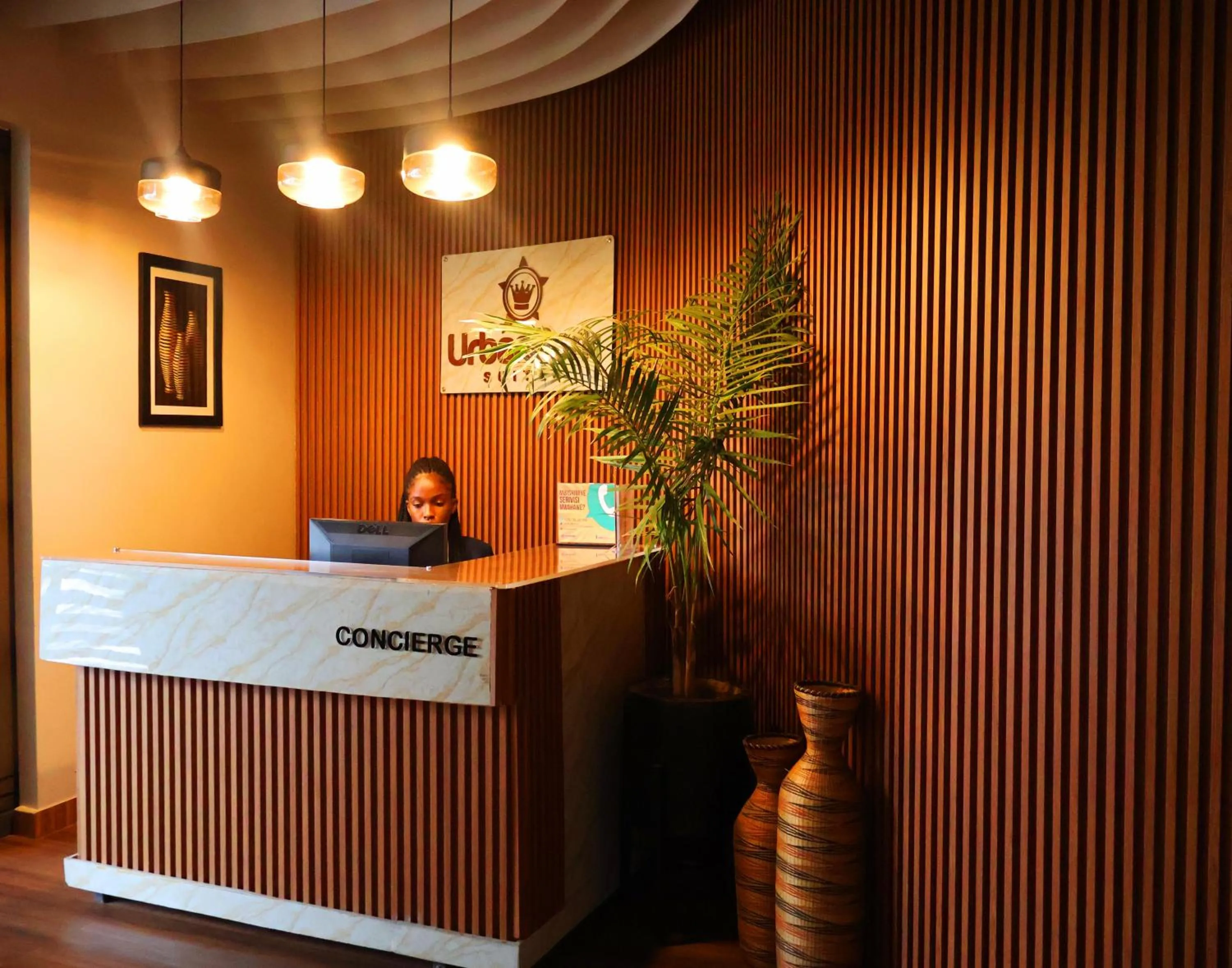 concierge in Urban Park Suites Hotel