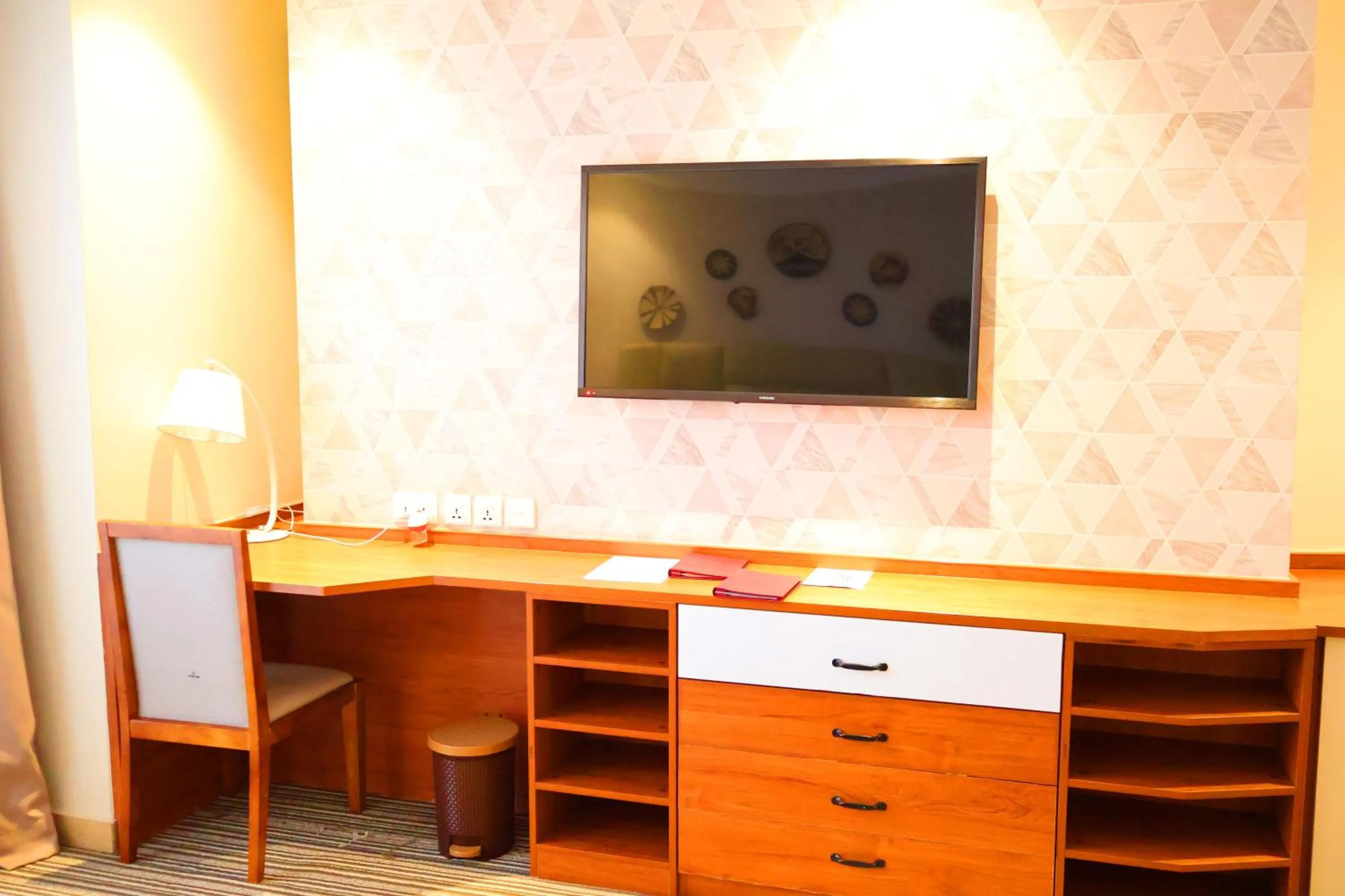 TV and multimedia in Urban Park Suites Hotel
