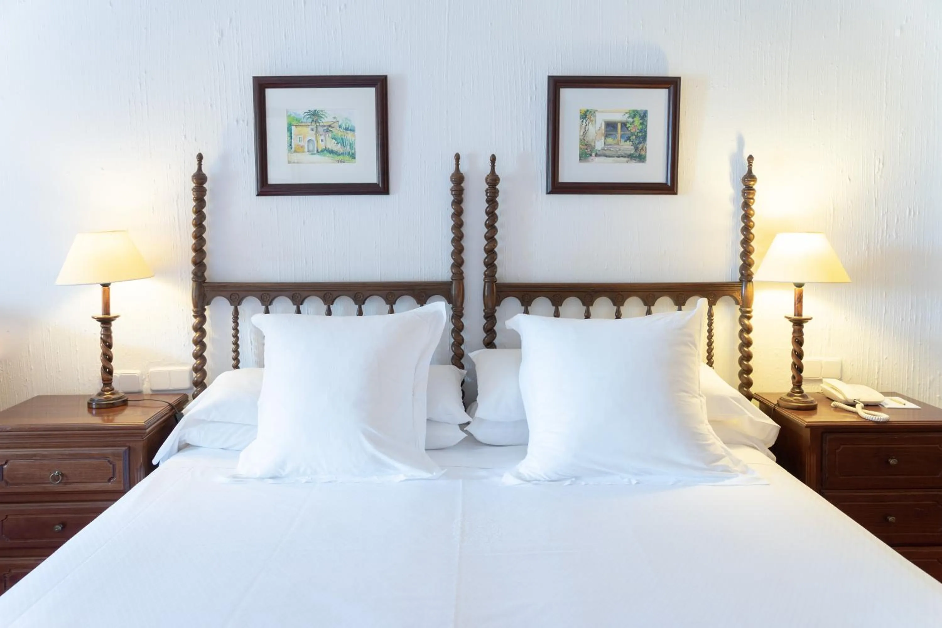 Bed in Hotel Bon Sol Resort & Spa