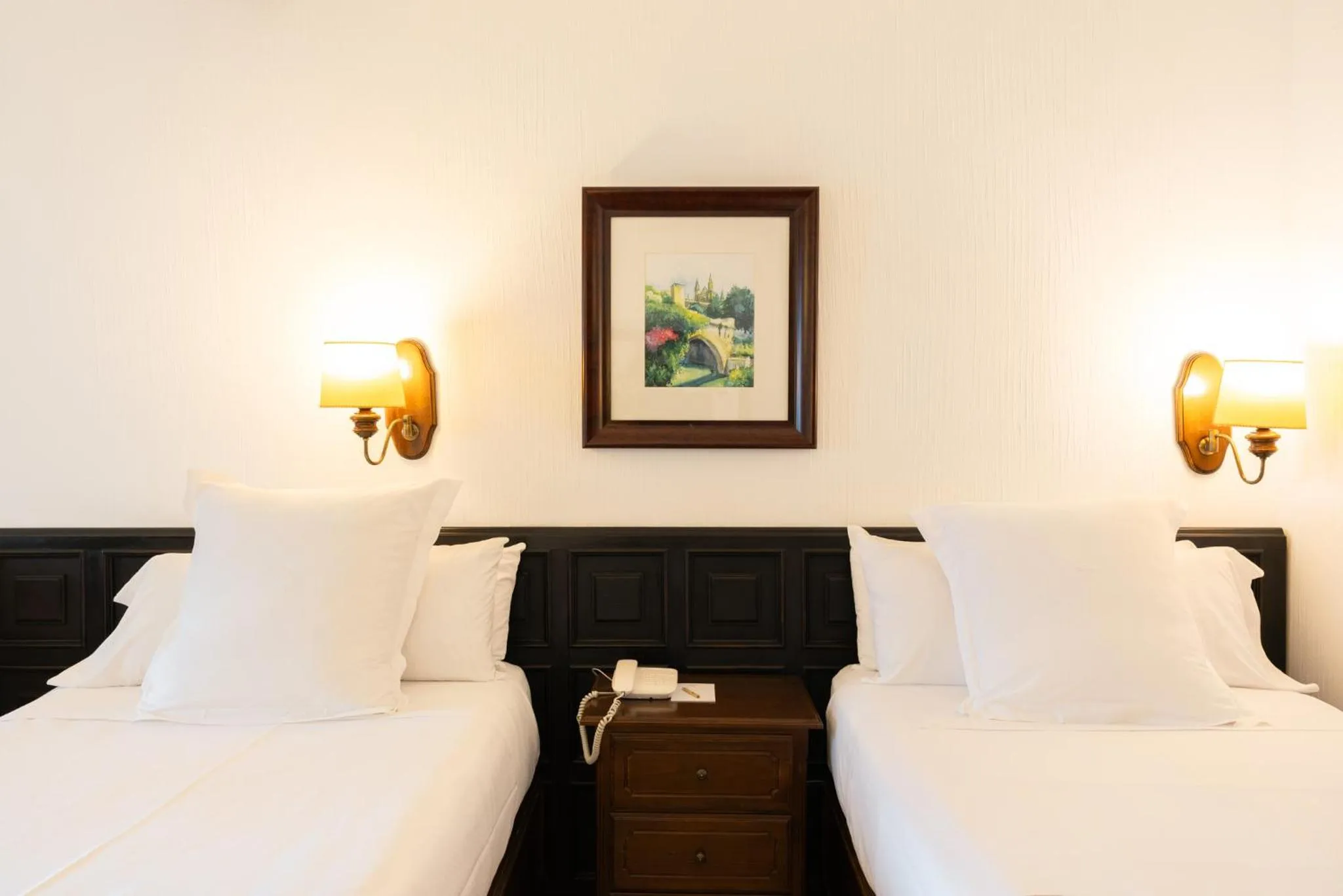 Bed in Hotel Bon Sol Resort & Spa