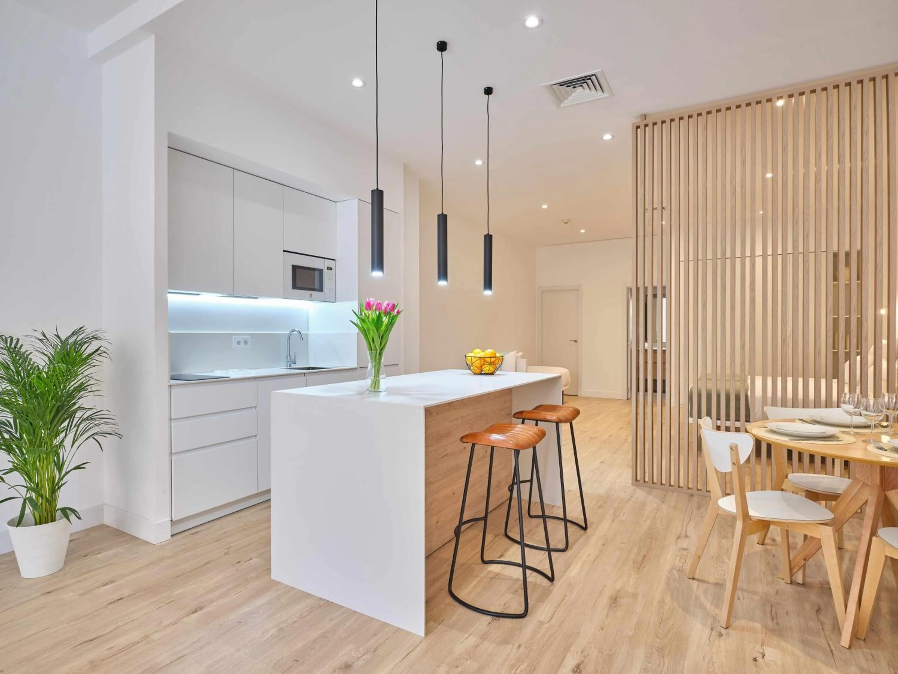 Kitchen or kitchenette in Paseo Suites Hotel