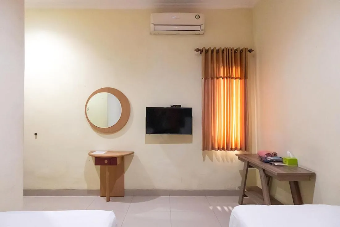 Bed in TwoSpaces Living at Toedjoeh Enam Homestay, Surabaya