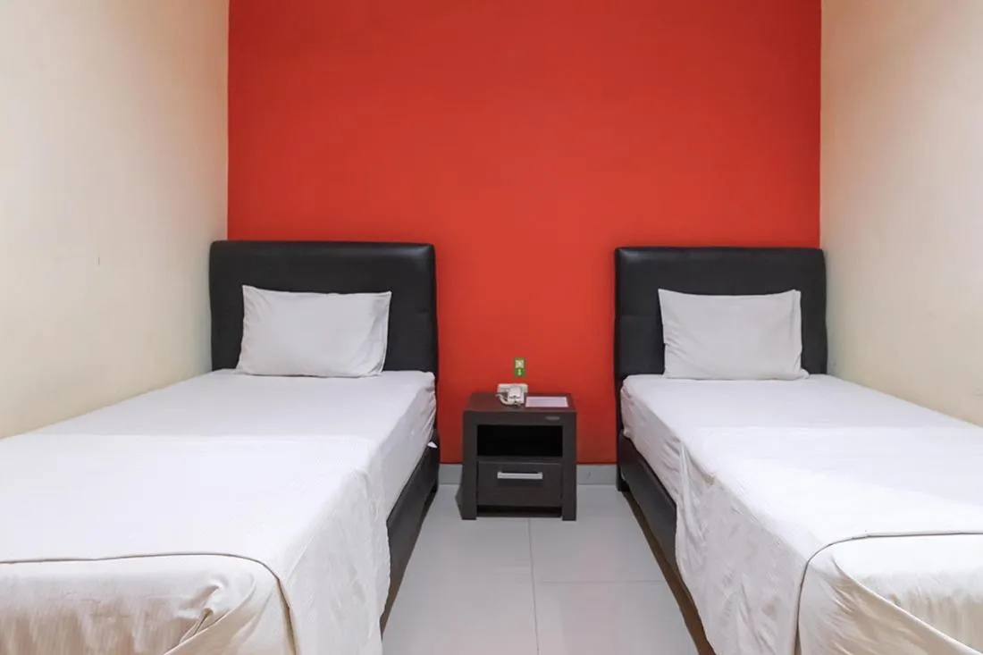 Bed in TwoSpaces Living at Toedjoeh Enam Homestay, Surabaya
