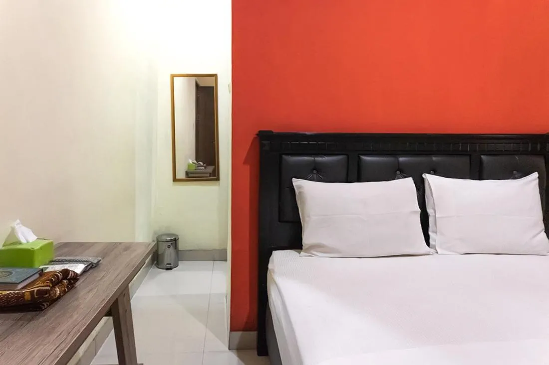 Bed in TwoSpaces Living at Toedjoeh Enam Homestay, Surabaya