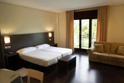 Photo of the whole room, Bed in Euba Hotel