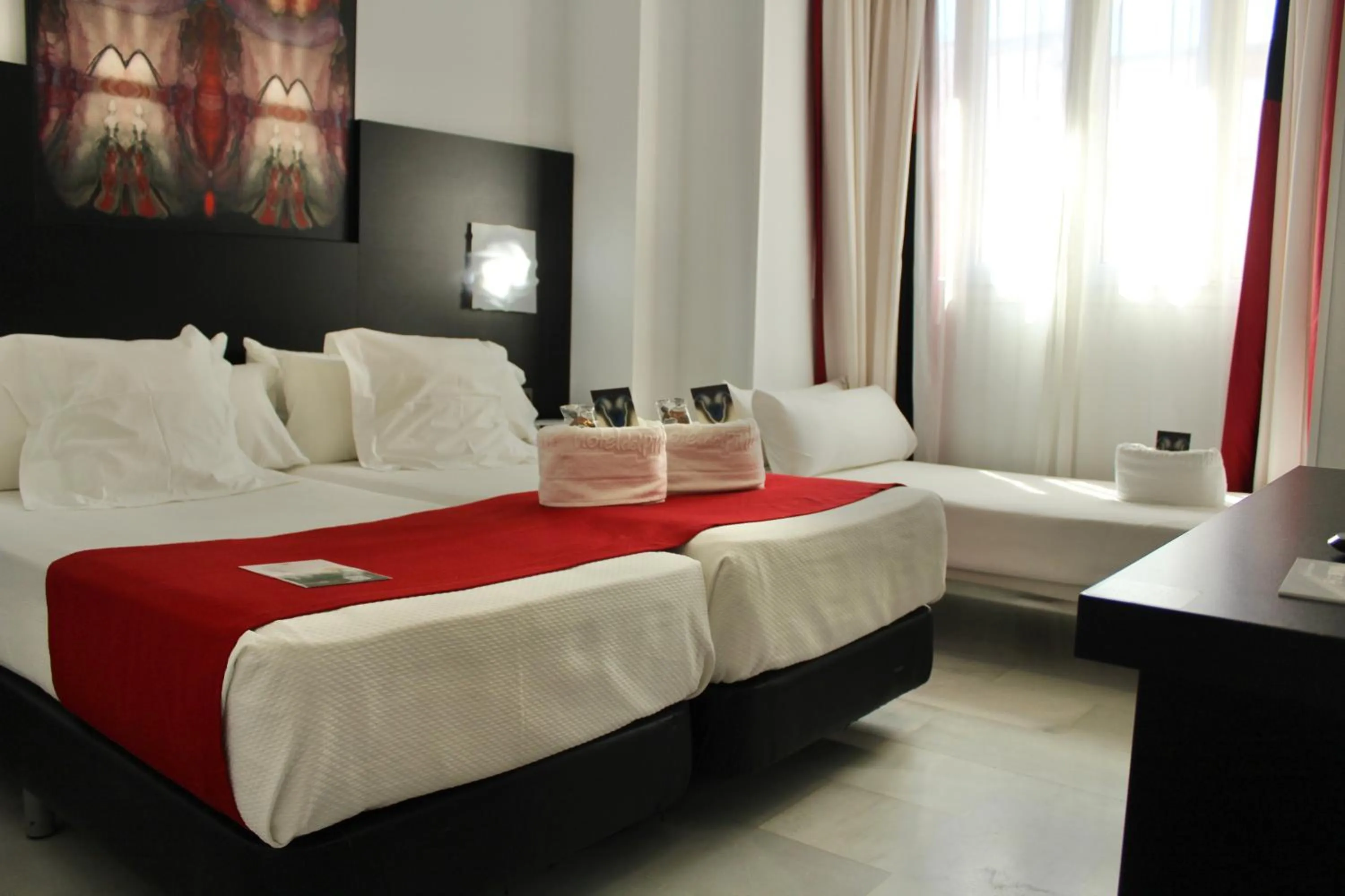 Bed in Hotel Del Pintor