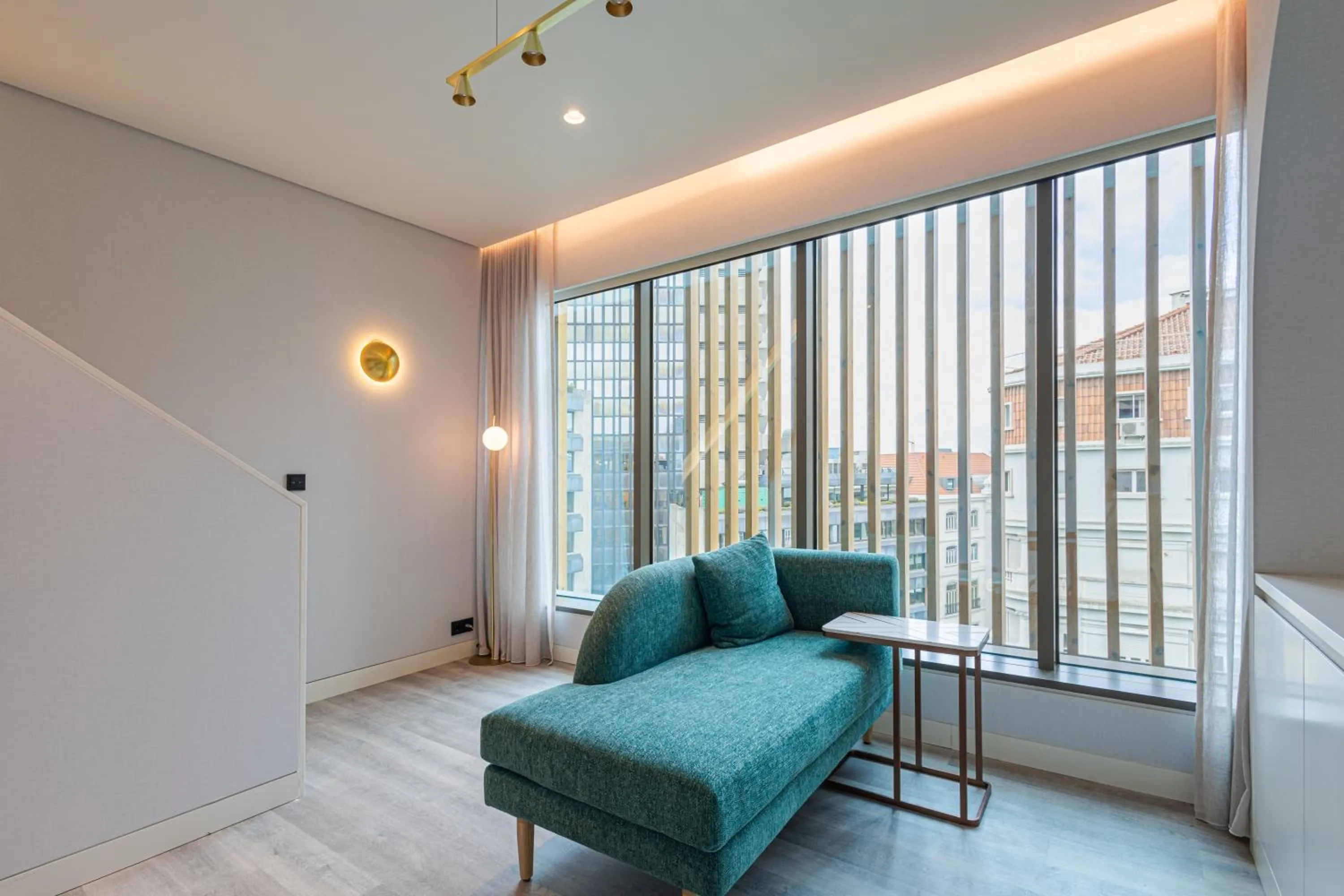 Living room, Bed in LUSTER Hotel