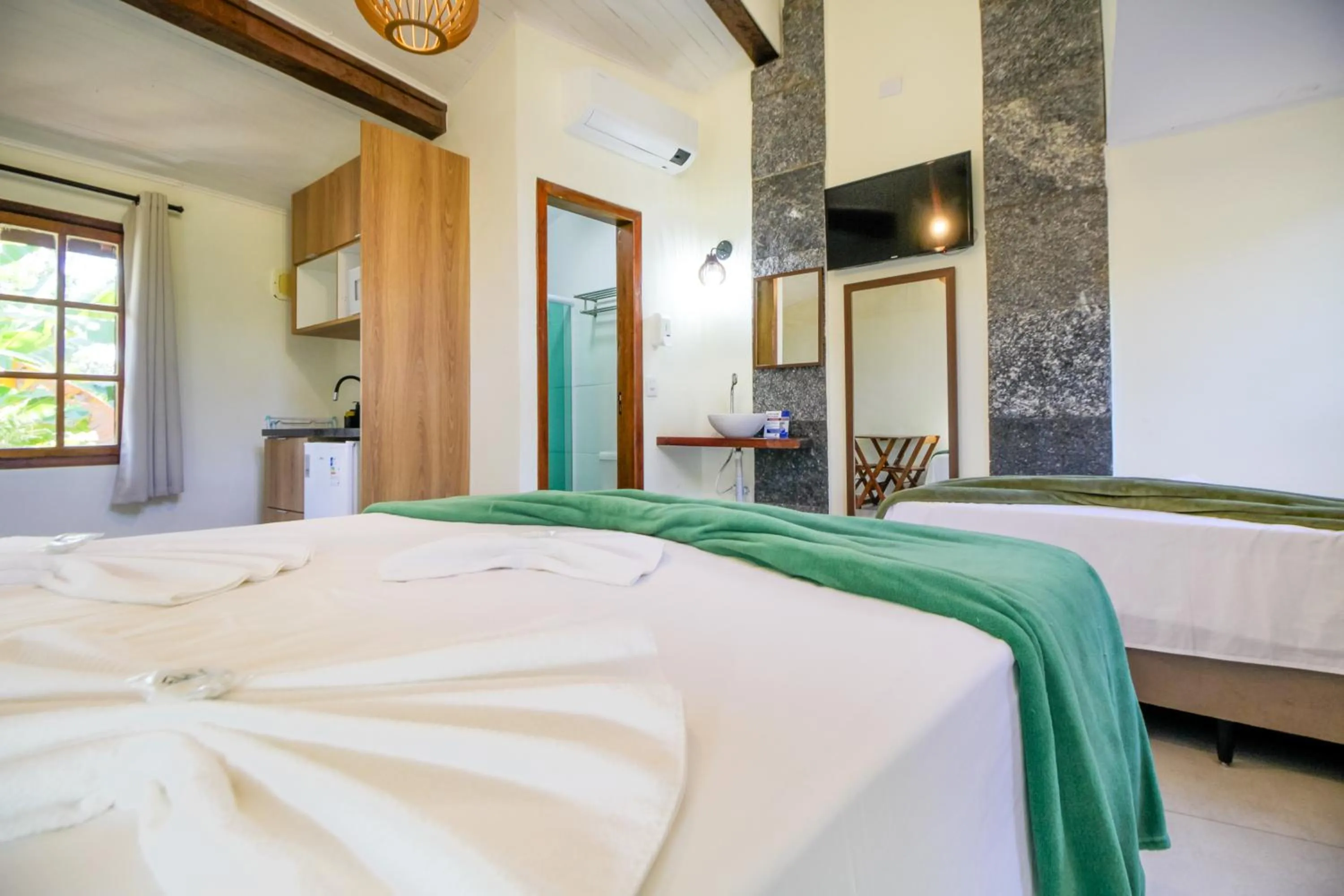 Bed in VELINN Pousada Canoa Ilhabela