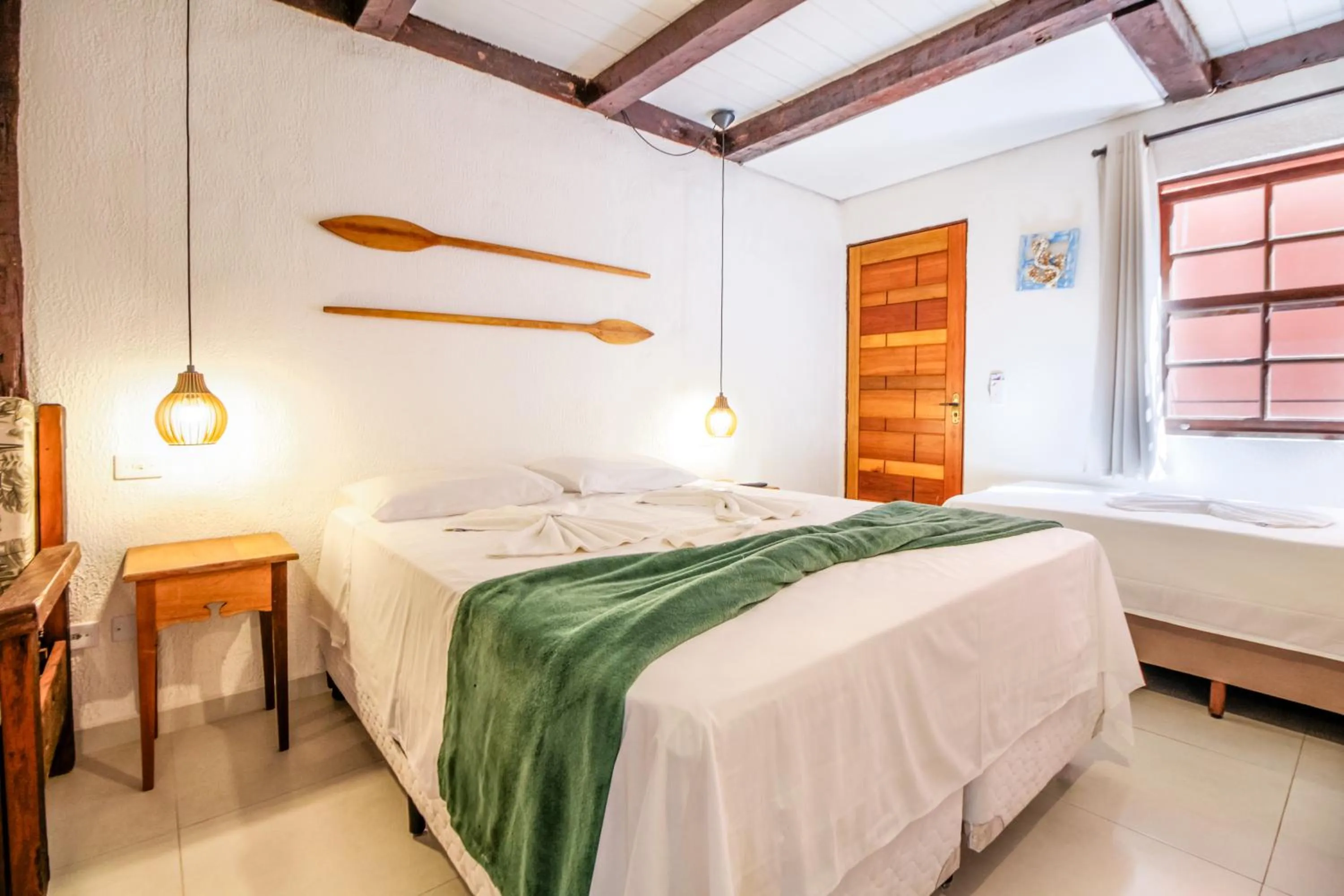 Bed in VELINN Pousada Canoa Ilhabela