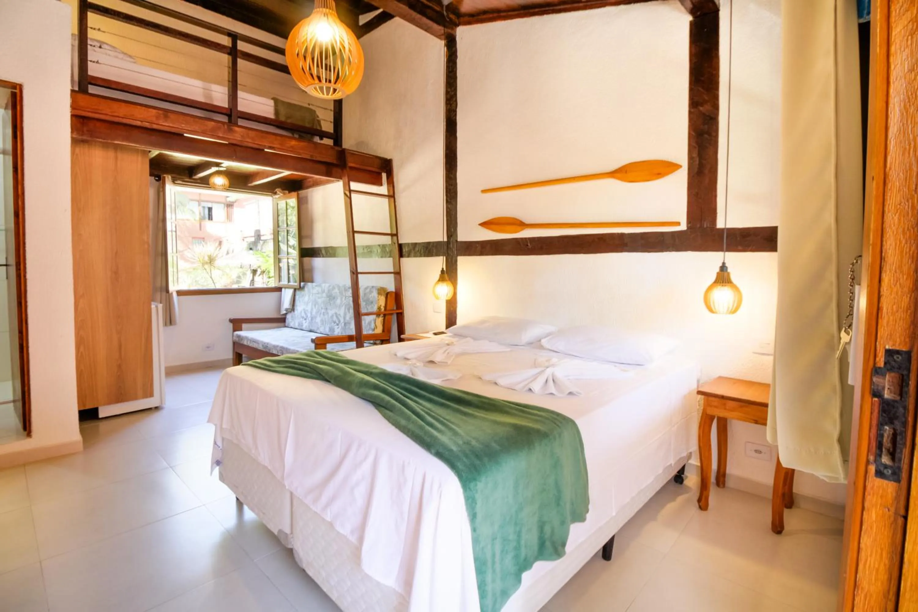Bed in VELINN Pousada Canoa Ilhabela