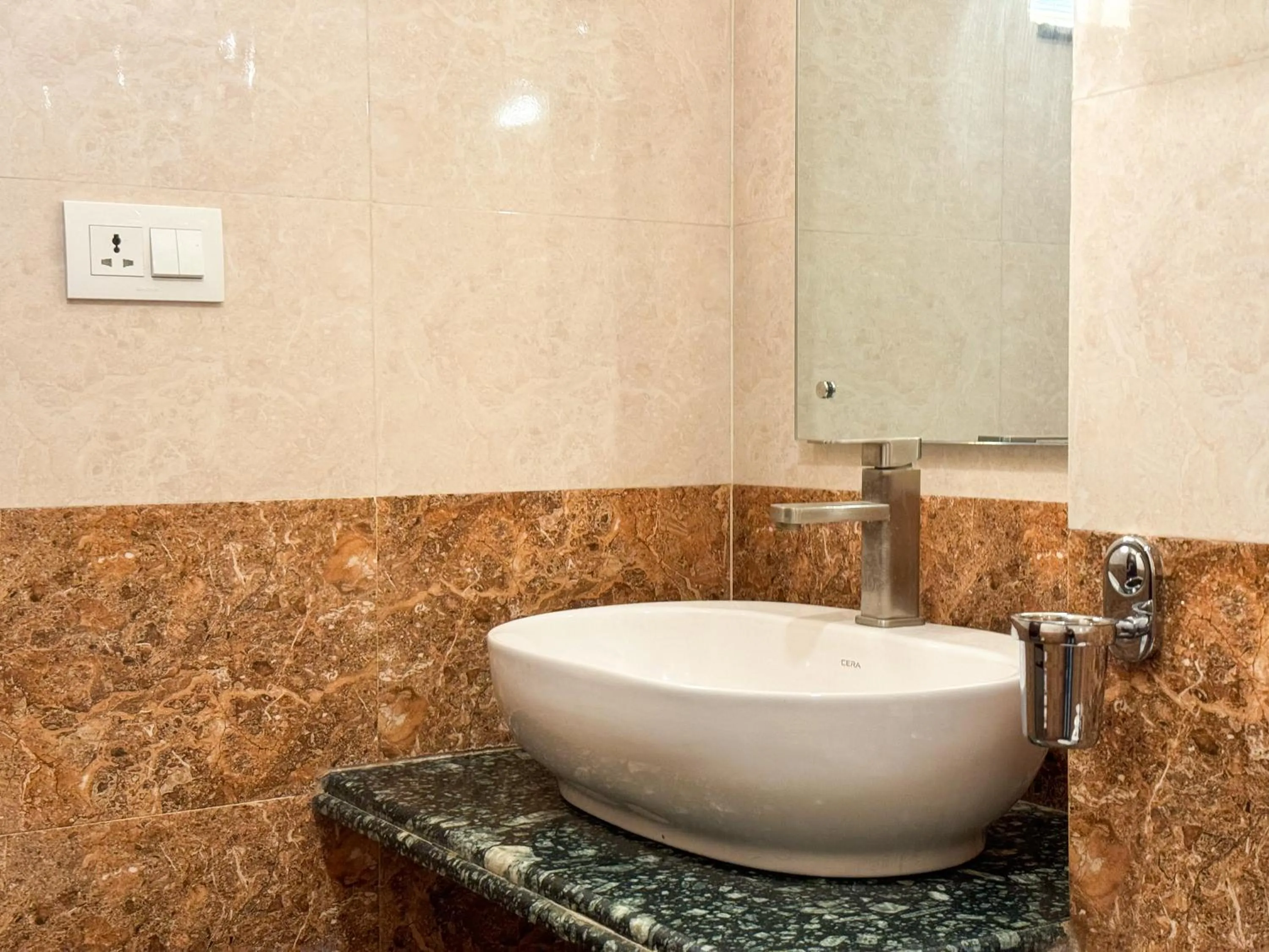 Bathroom in Hotel Abi International