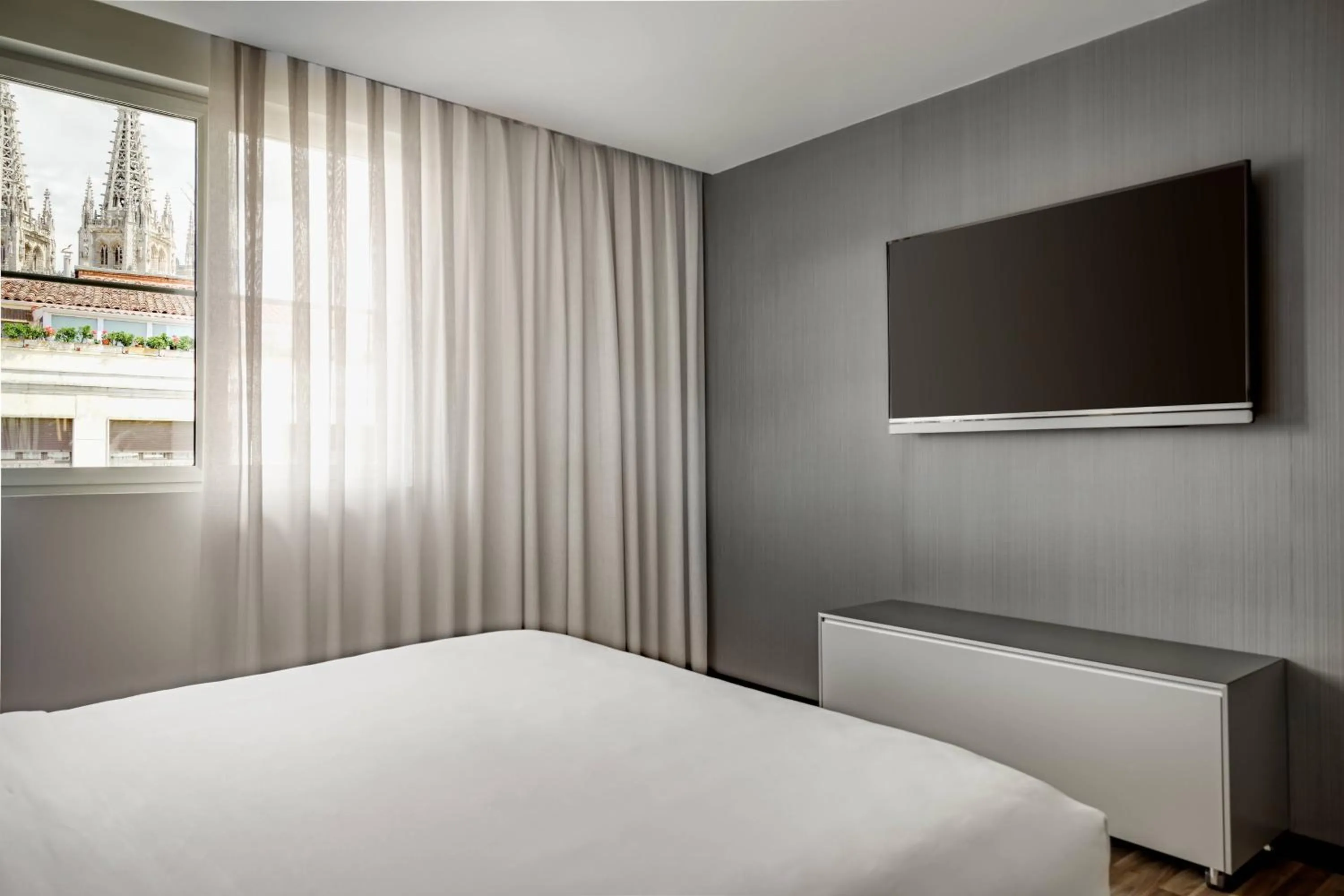 Photo of the whole room, Bed in AC Hotel Burgos by Marriott