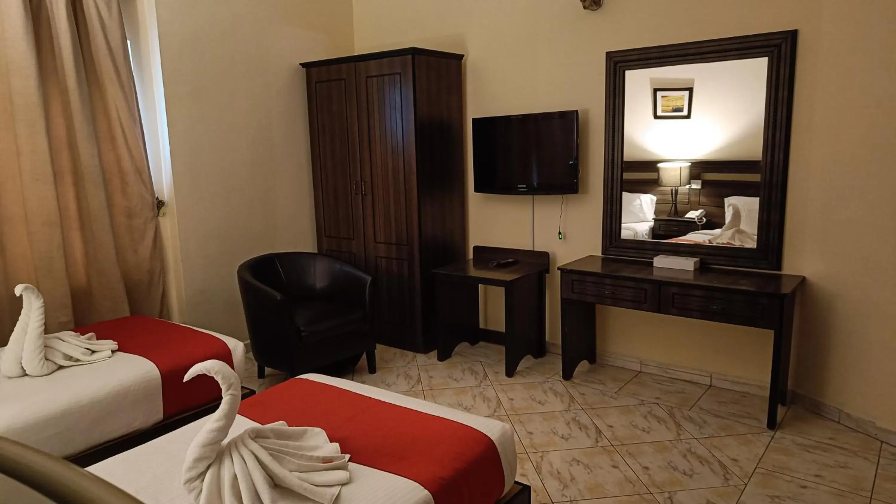 Standard Twin Room in Ruwi Beach Hotel Apartments - MAHA HOSPITALITY GROUP Standard Twin Room in Ruwi Beach Hotel Apartments - MAHA HOSPITALITY GROUP