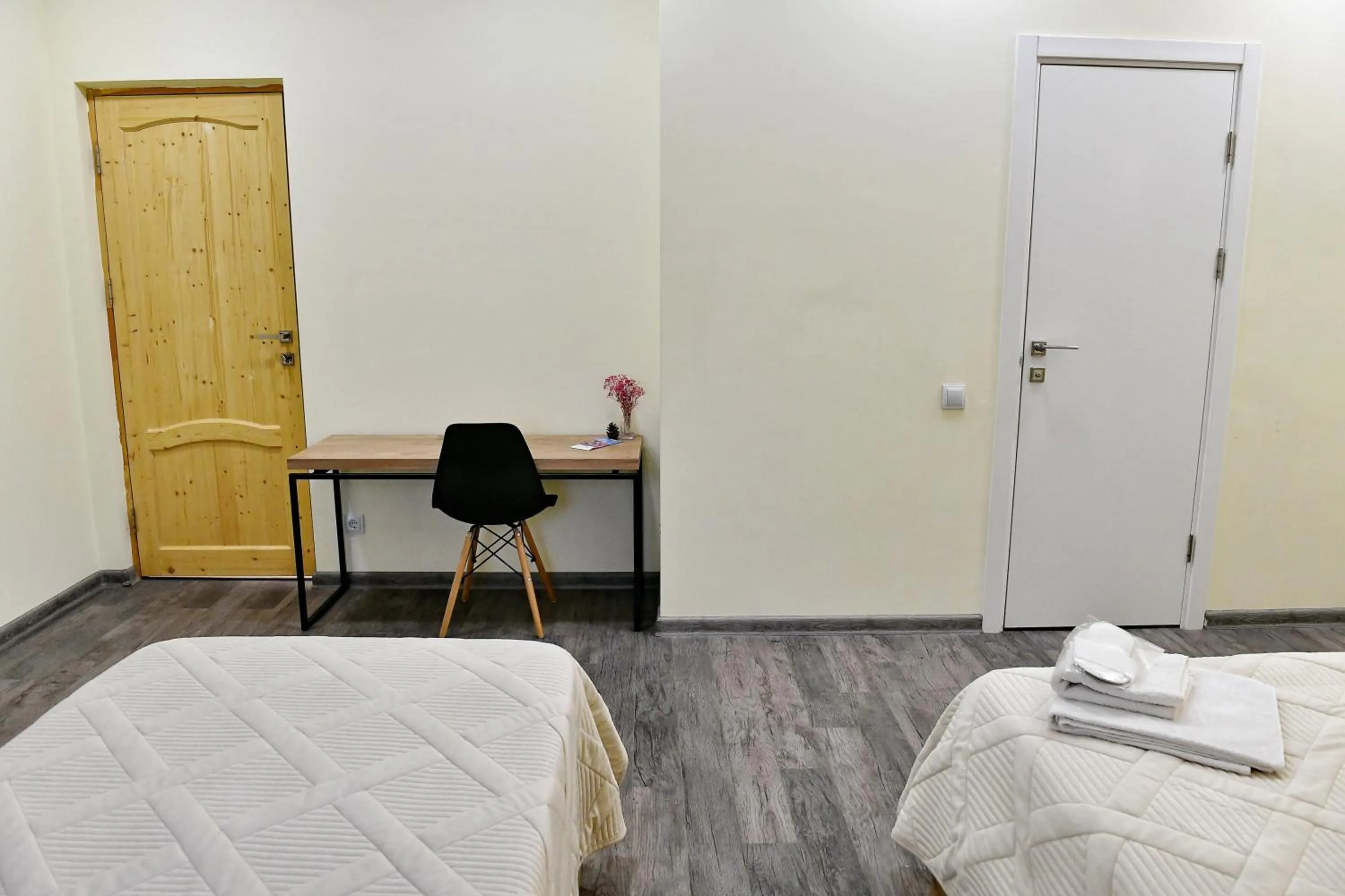 Photo of the whole room, Bed in woolway studios