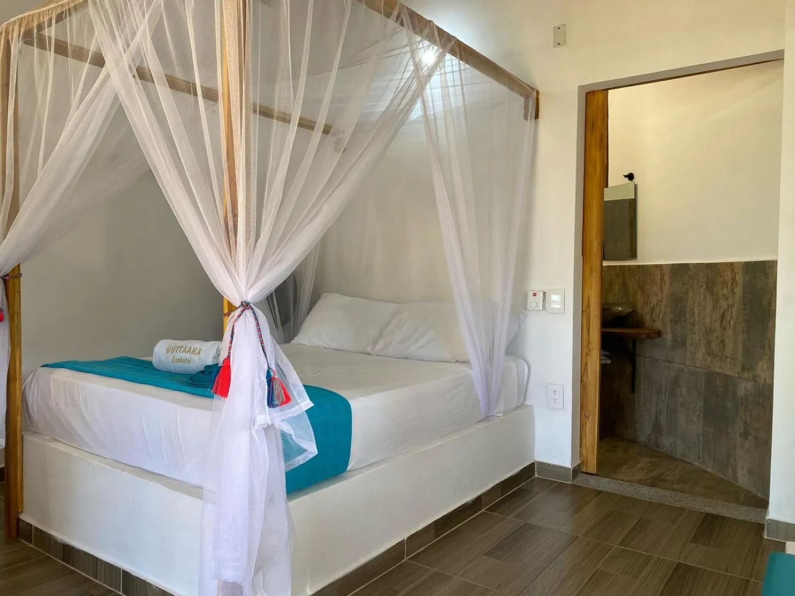 Bed in UUTTAAKA Eco-Hotel