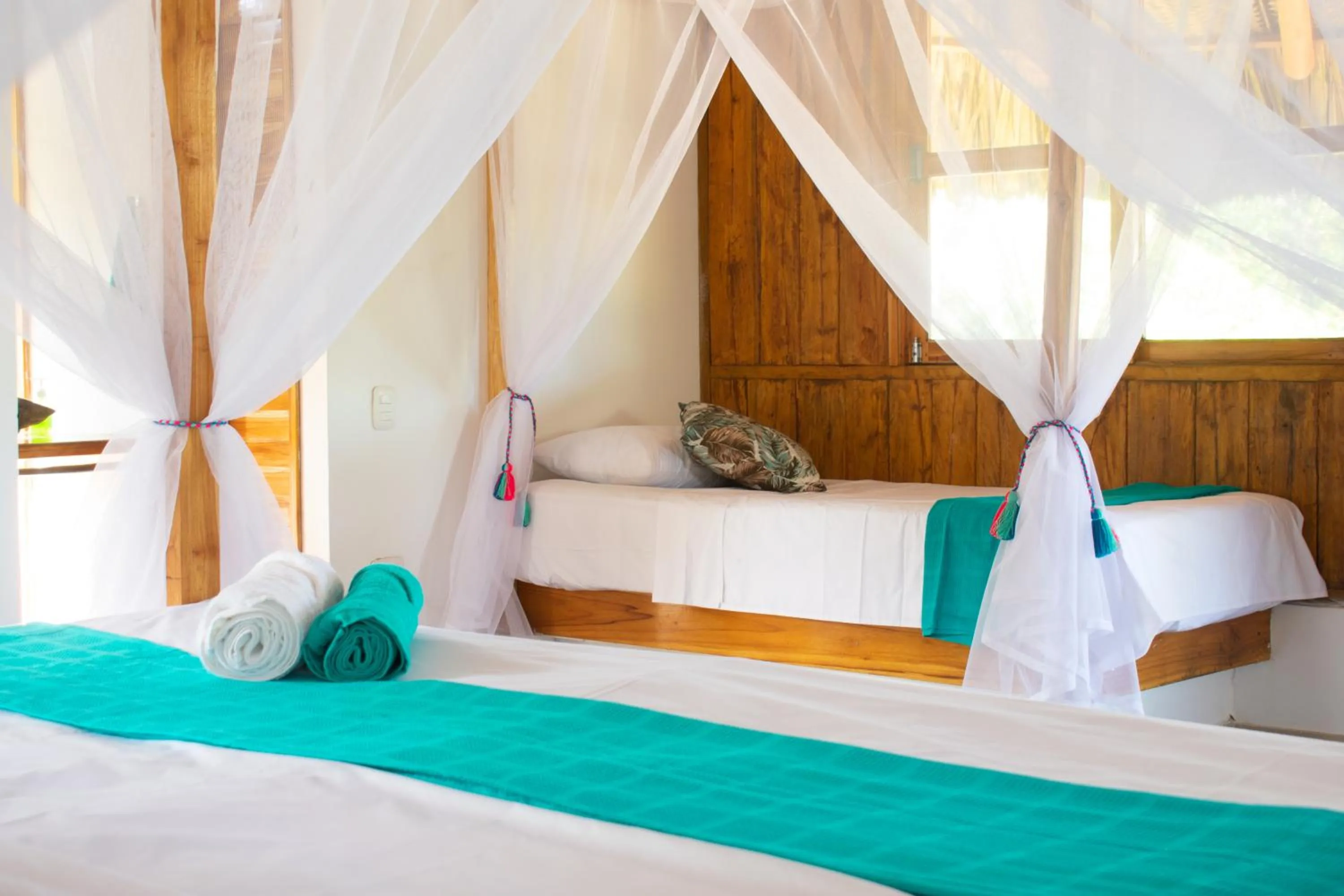 Bed in UUTTAAKA Eco-Hotel