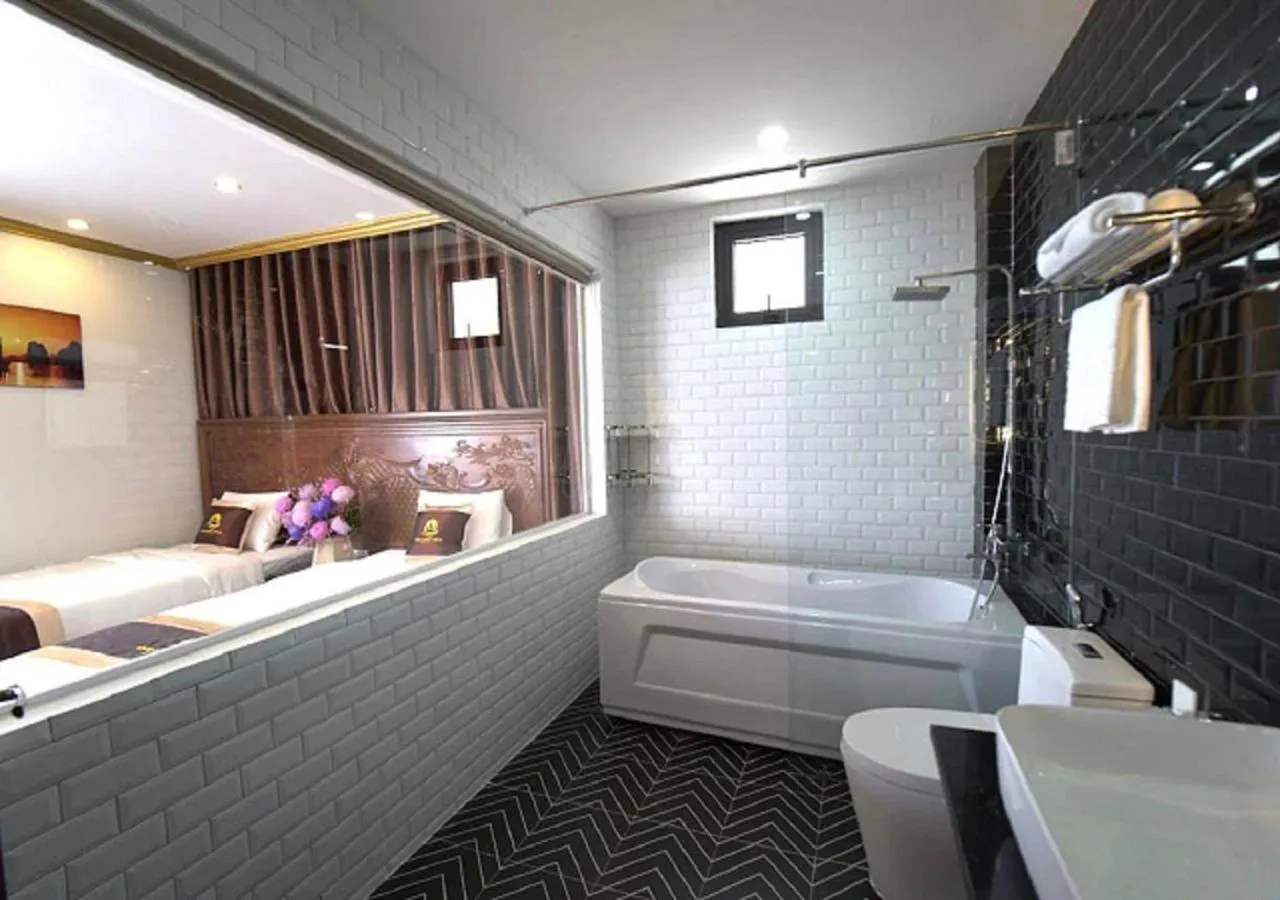 Shower, Bed in Golden Sea HaLong Hotel